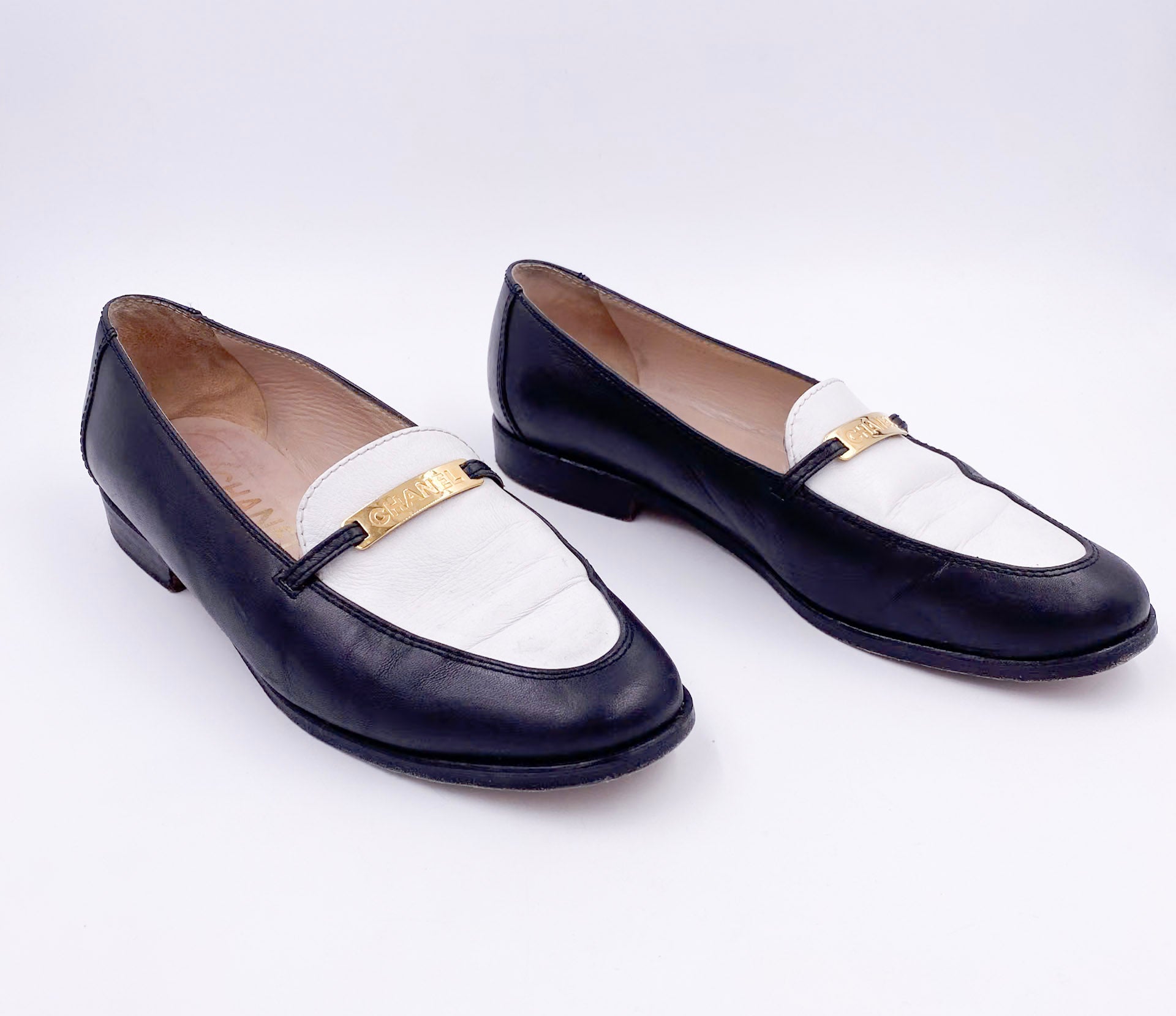 Chanel Black/White Loafers with Gold Emblem - The Kit Vintage