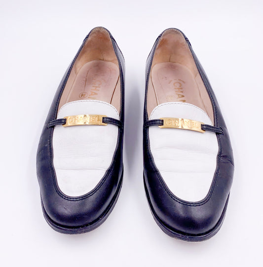 Chanel Black/White Loafers with Gold Emblem - The Kit Vintage