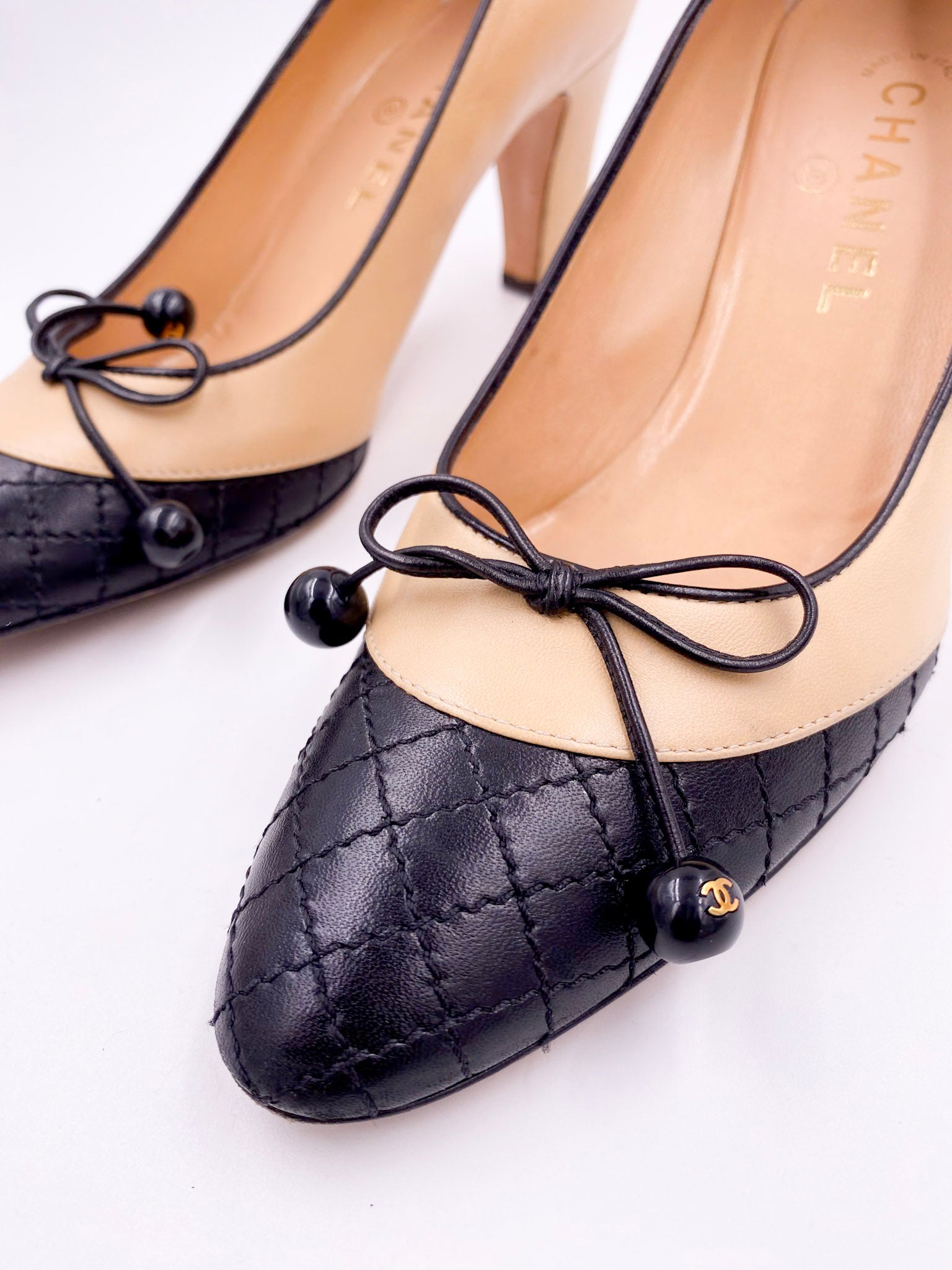 Chanel Beige Pump with Black Quilted Toe - The Kit Vintage
