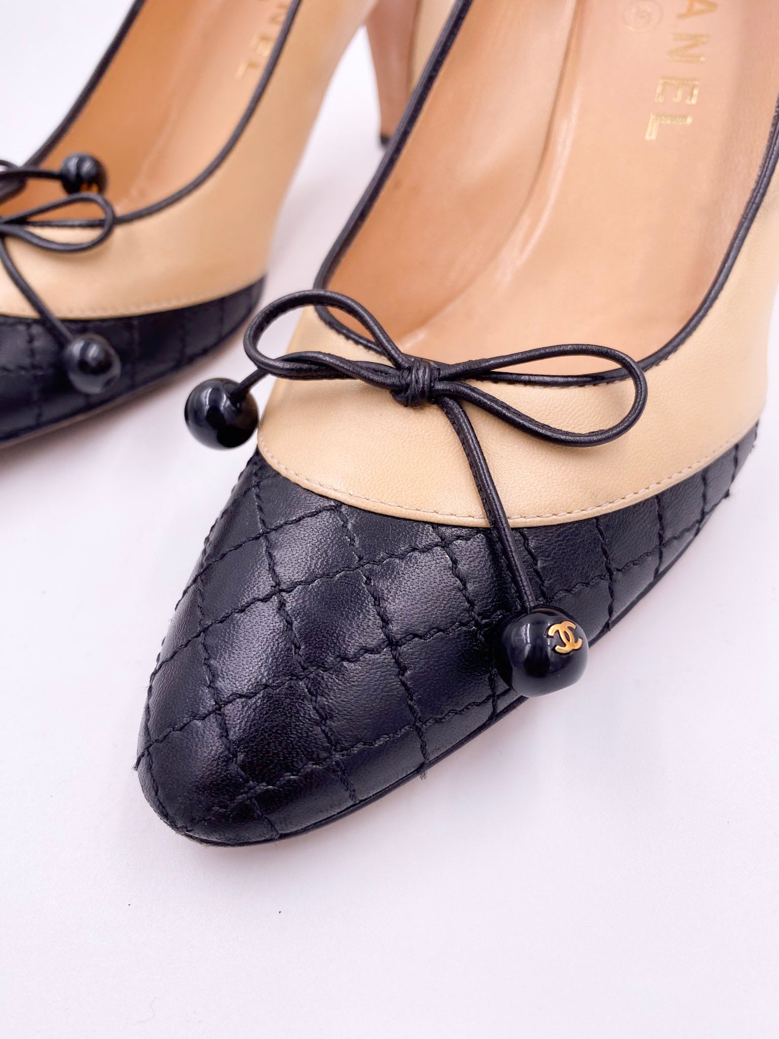 Chanel Beige Pump with Black Quilted Toe - The Kit Vintage