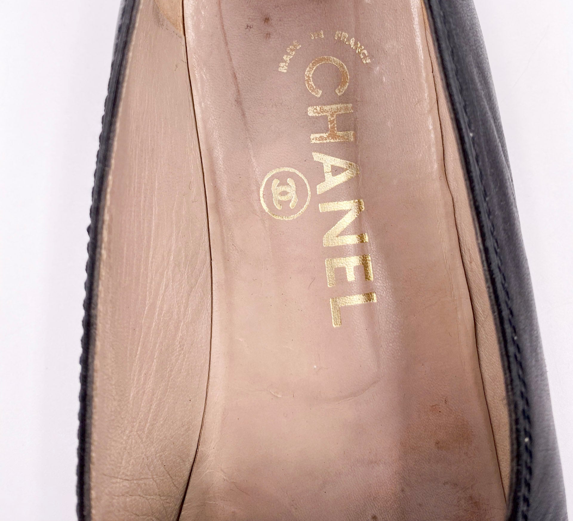 Chanel Black/White Loafers with Gold Emblem - The Kit Vintage