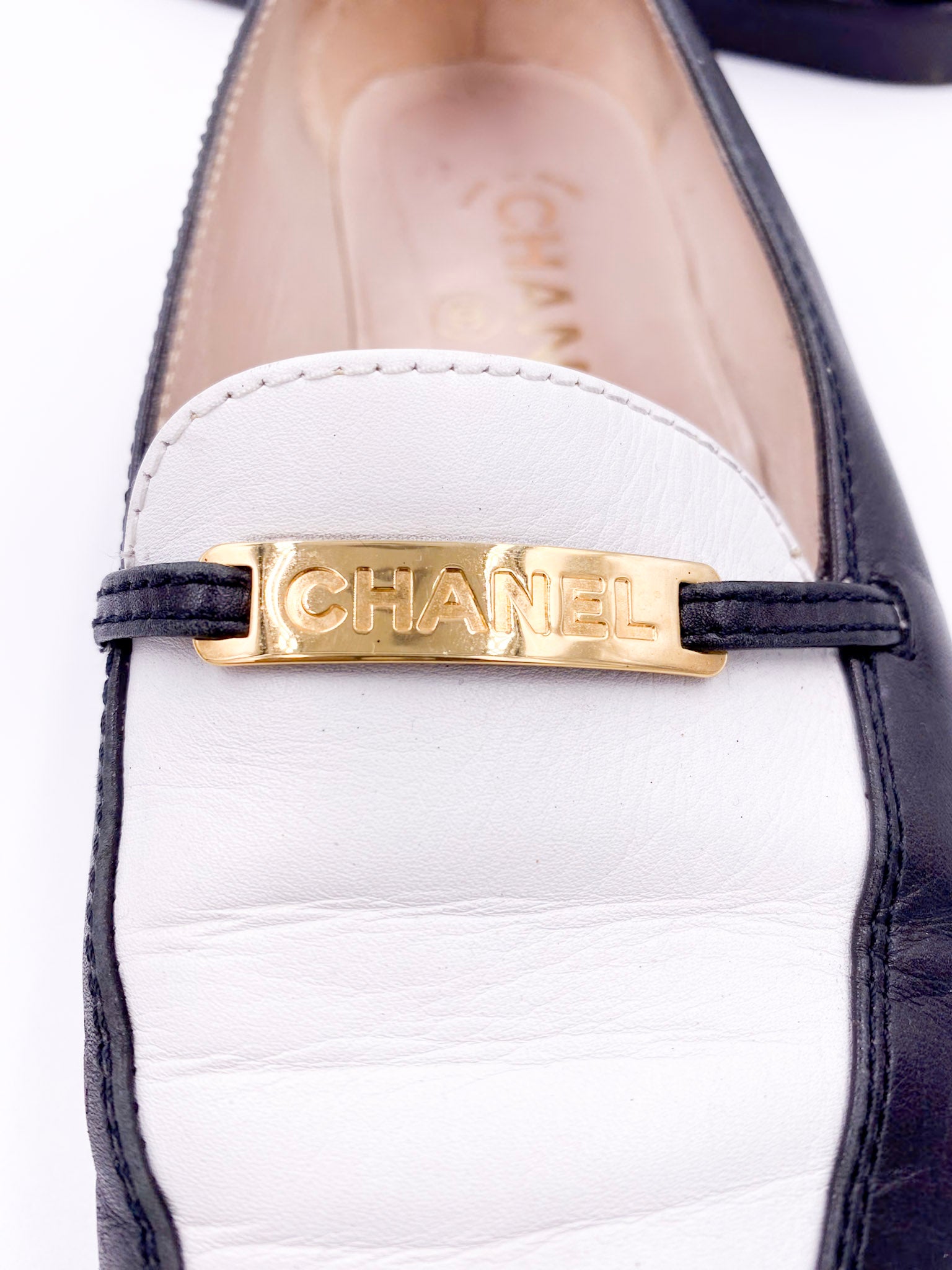 Chanel Black/White Loafers with Gold Emblem - The Kit Vintage