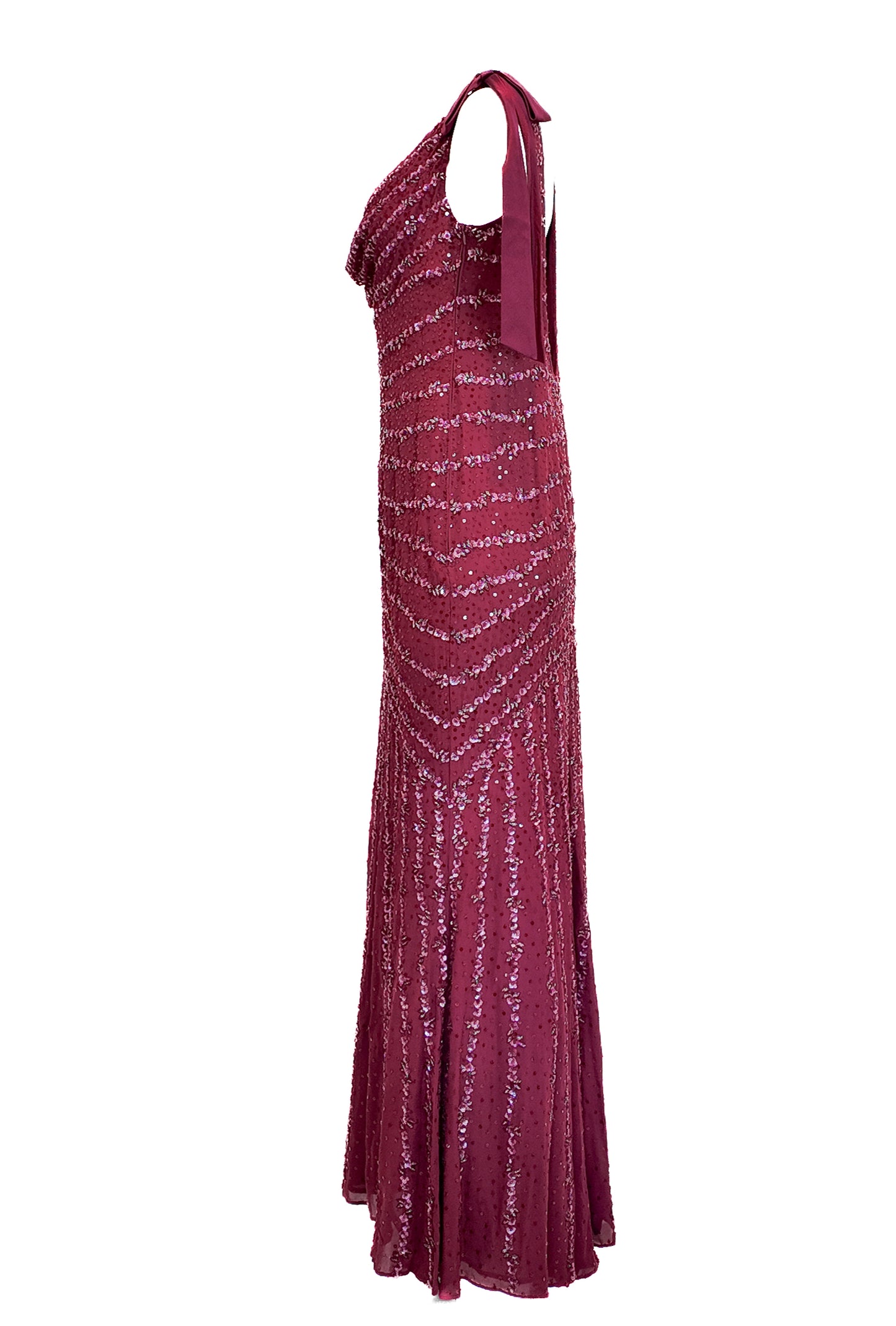 Magenta evening gown with a halter neck on a white background
