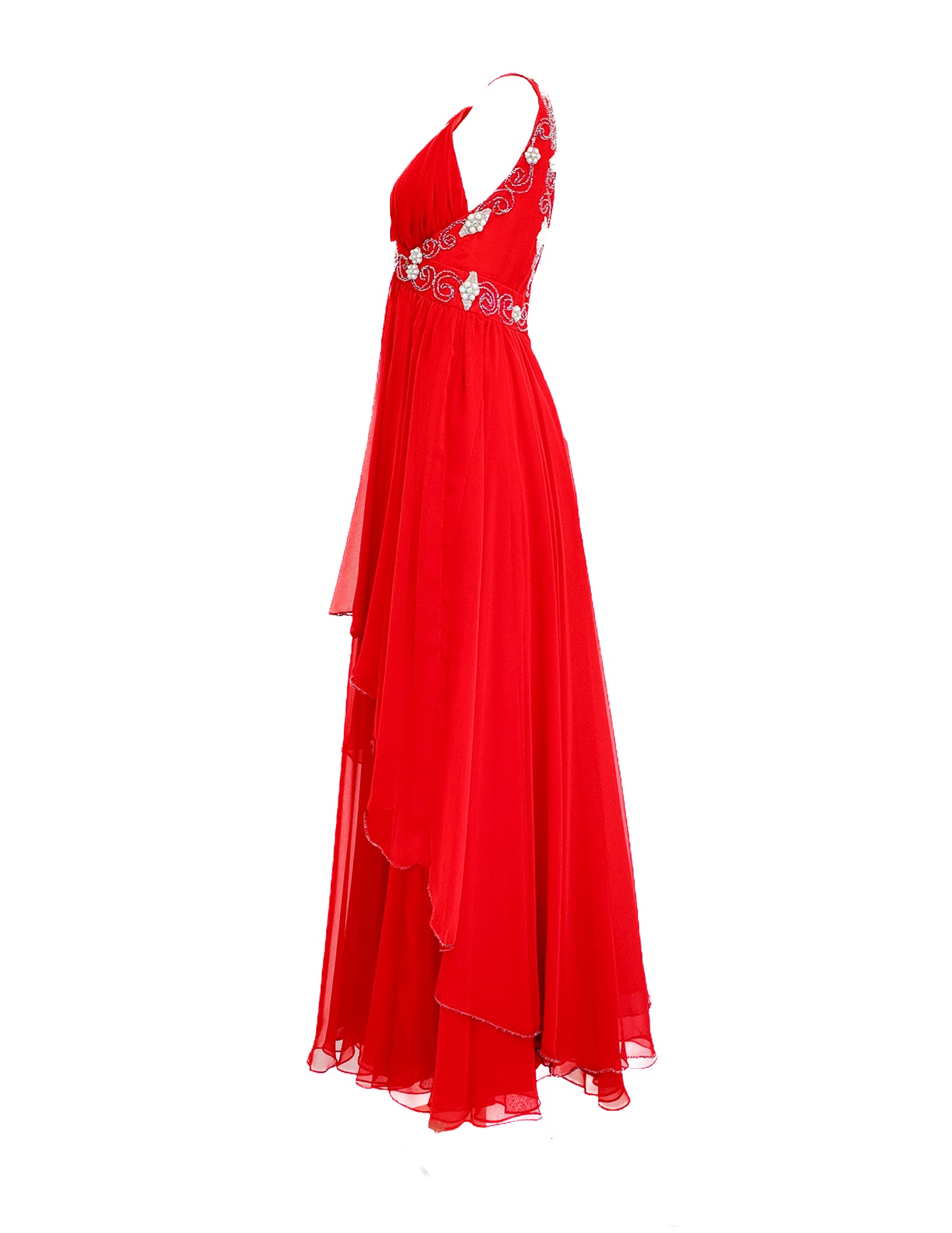 Red evening gown with floral embellishments on a white background