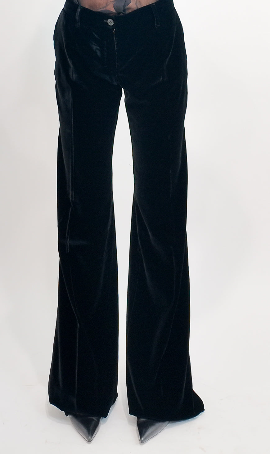 Black velvet pants on a white background