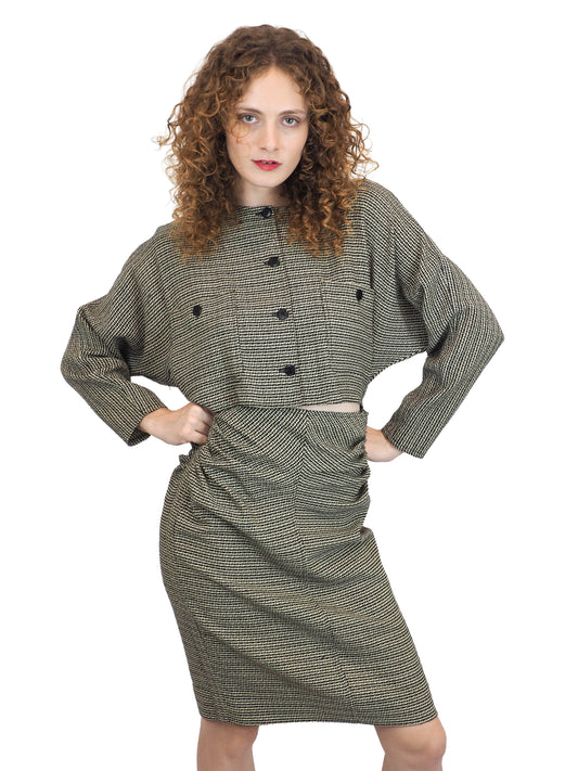 A vintage houndstooth Gucci 1980s checkered mini dress with buttons and a center cut out