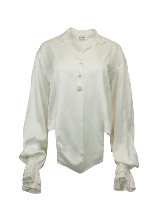 vintage designer Jane booke. An off-white silk blouse with a pointed collar, buttoned front, and dramatic ruffled cuffs, shown against a plain white background.