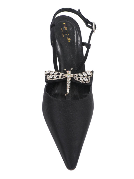 A pair of vintage Kate spade black pointed-toe slingback heels with delicate ankle straps, embellished with a jeweled bow detail on the instep and a small gold buckle.