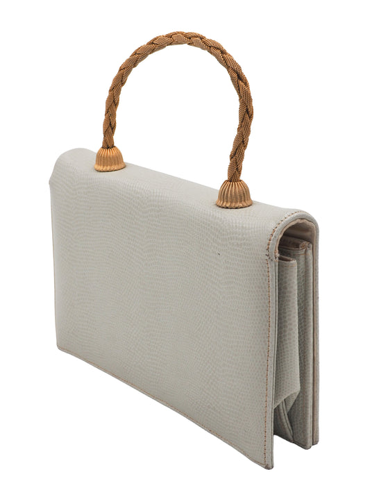 A vintage white lizard textured leather clutch handbag with a braided tan rope handle and gold-toned metal accents