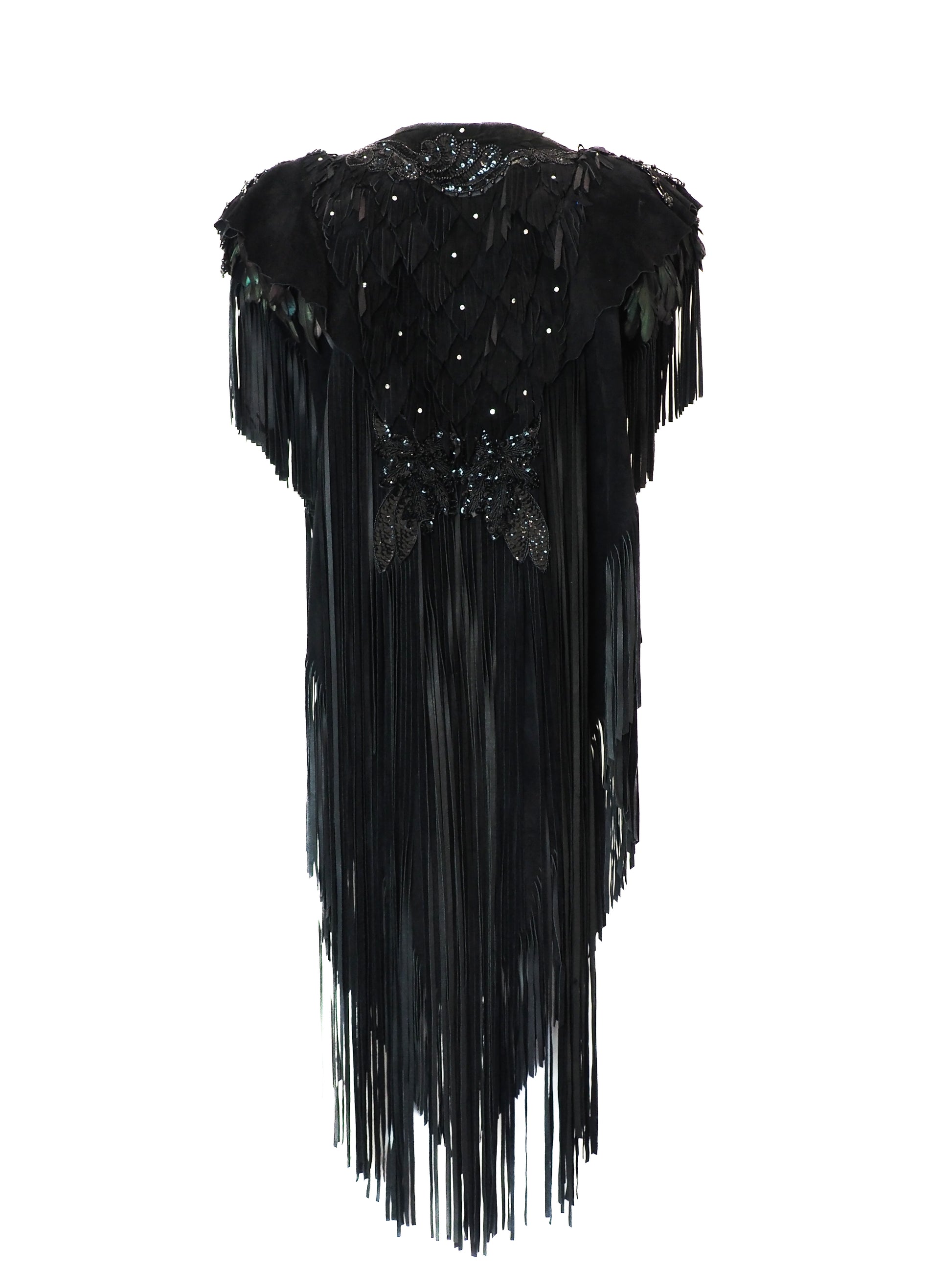 Black fringe dress with sequin embellishments on a white background