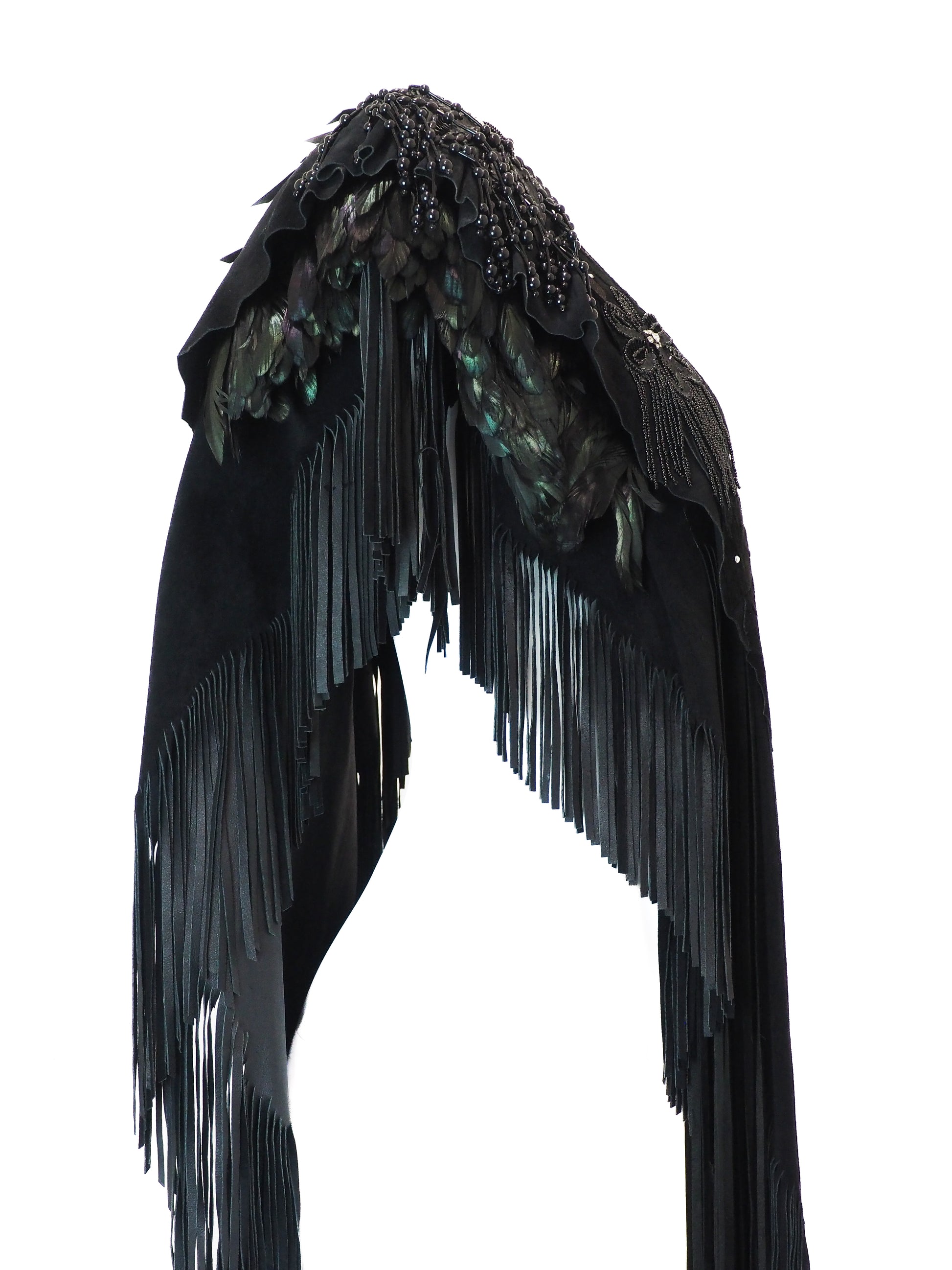 Black feathered garment with fringe on a white background