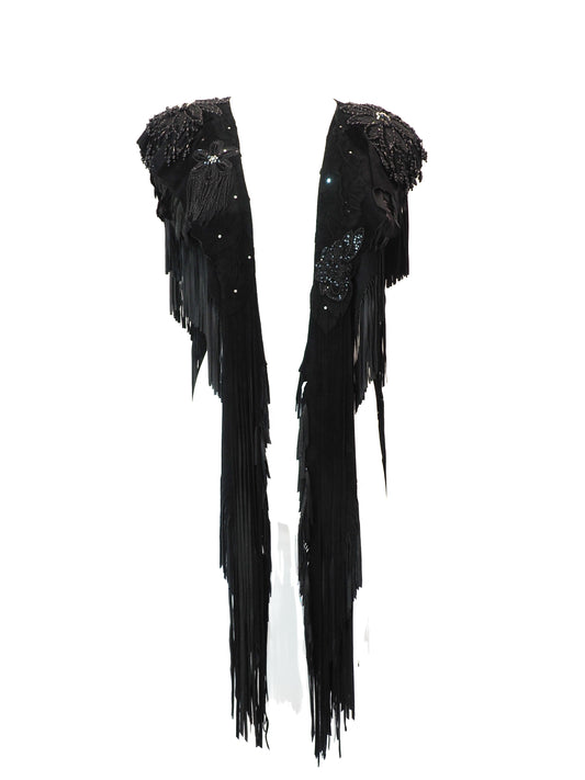 Black fringe garment with sequin details on a white background