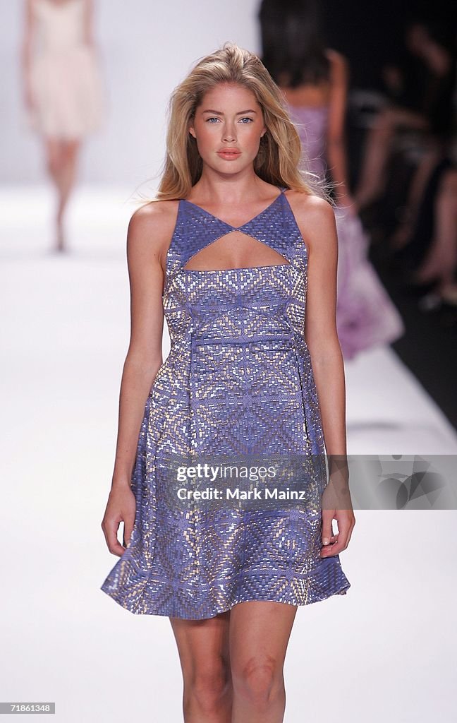 Bill Blass for Neiman Marcus Spring 2007 Mercedes Benz fashion week model wearing a blue metallic patterned dress on a runway