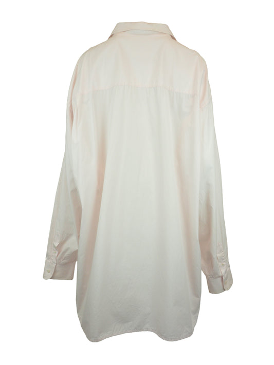A vintage Maison Martin margiela 2001 pale blush pink oversized button-down shirt dress with a pointed collar, long sleeves, and a small black embroidered clover on the left chest