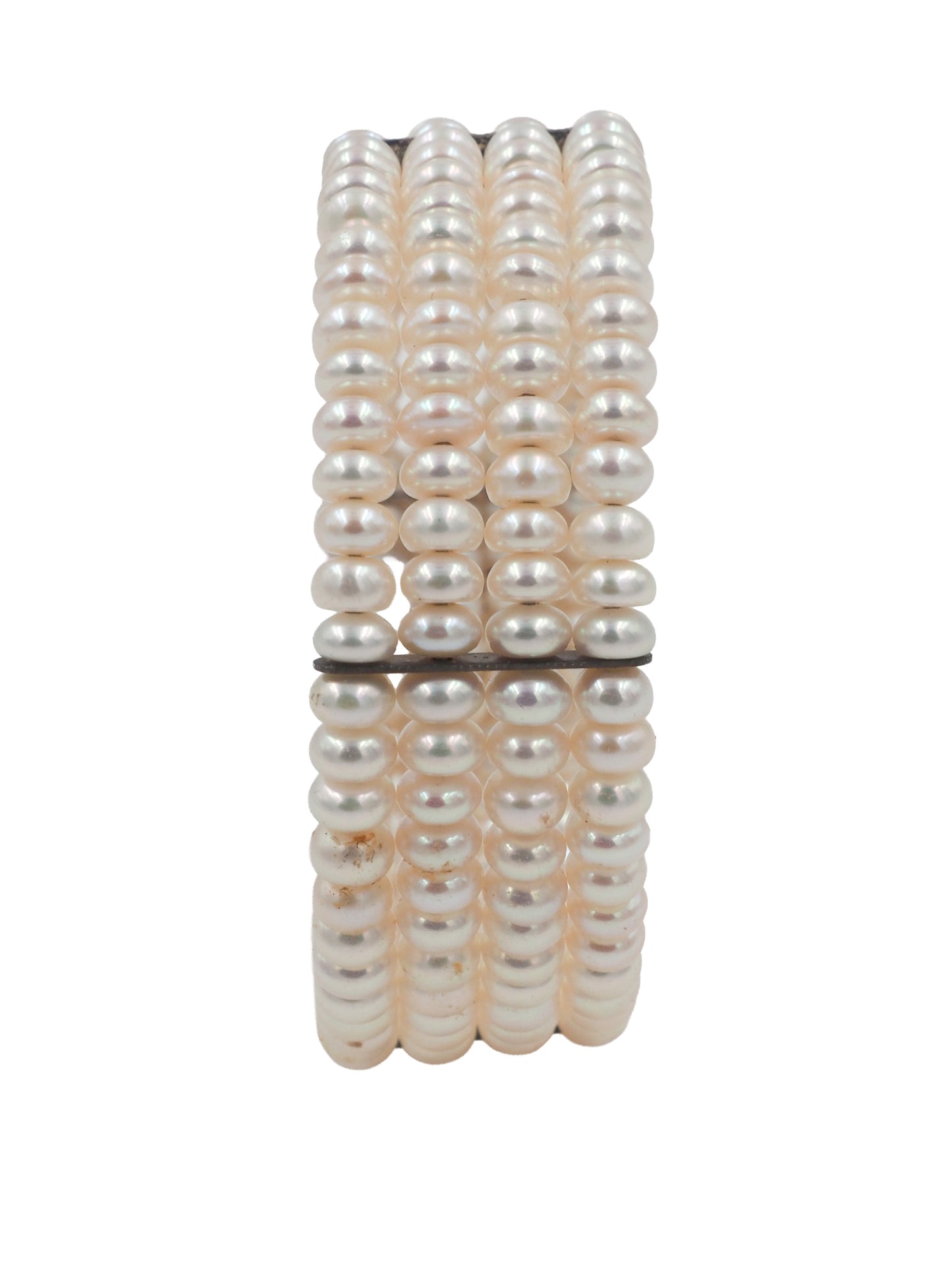 A vintage beaded wrap bracelet featuring rows of small, lustrous cream-colored pearls separated by thin black spacer beads