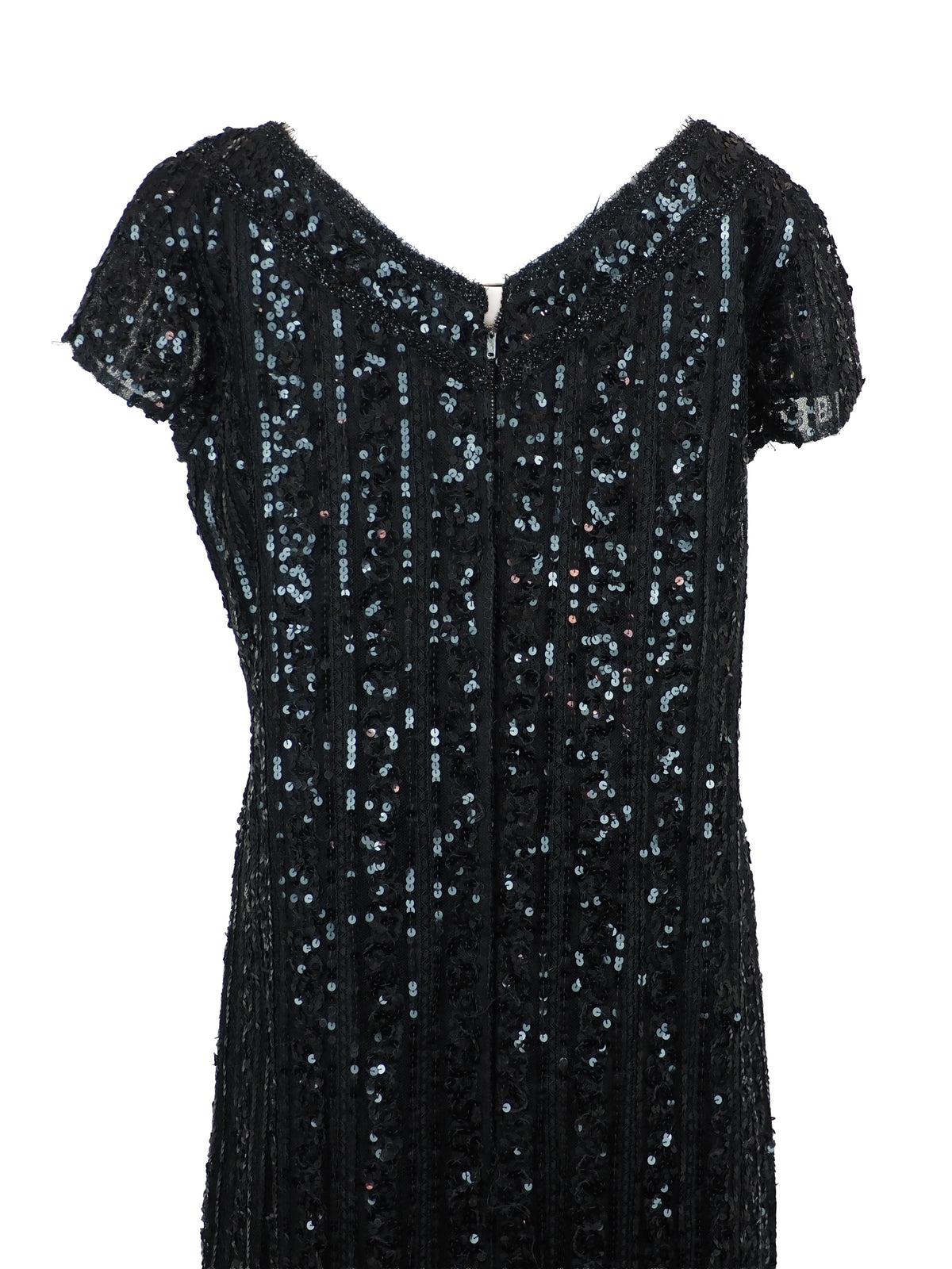 A vintage 1960s black sequined evening dress with short cap sleeves and a brown fox fur-trimmed hem