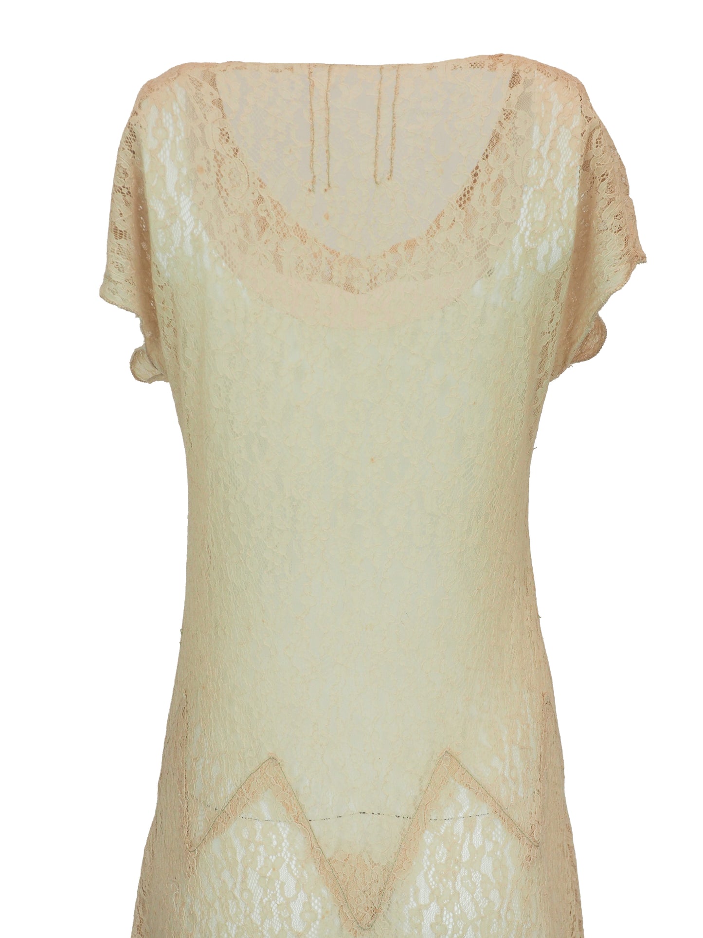 A vintage 1920s light beige lace maxi dress with short flutter sleeves, a scoop neckline, and a scalloped zigzag pattern around the waist