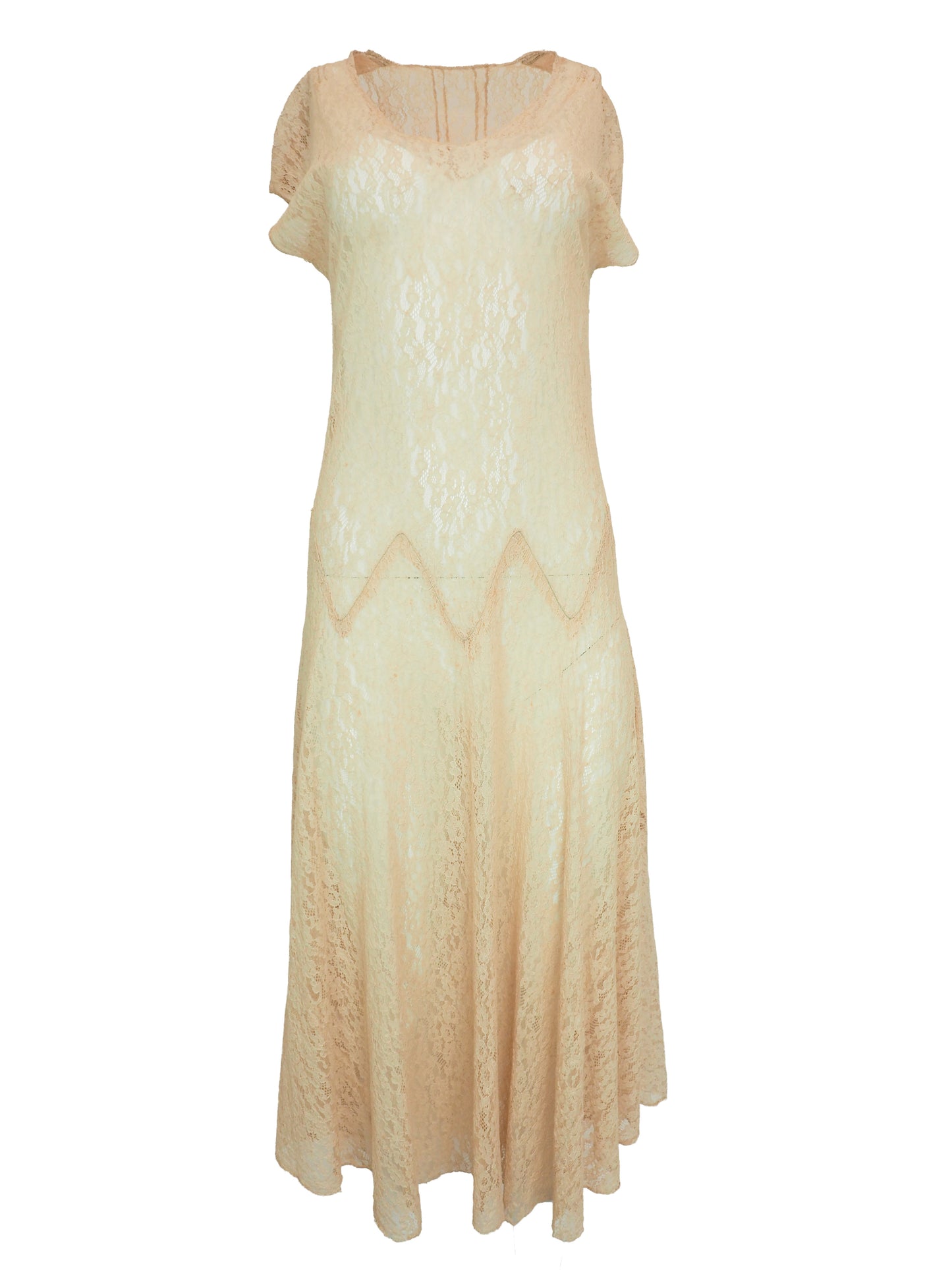 A vintage 1920s light beige lace maxi dress with short flutter sleeves, a scoop neckline, and a scalloped zigzag pattern around the waist