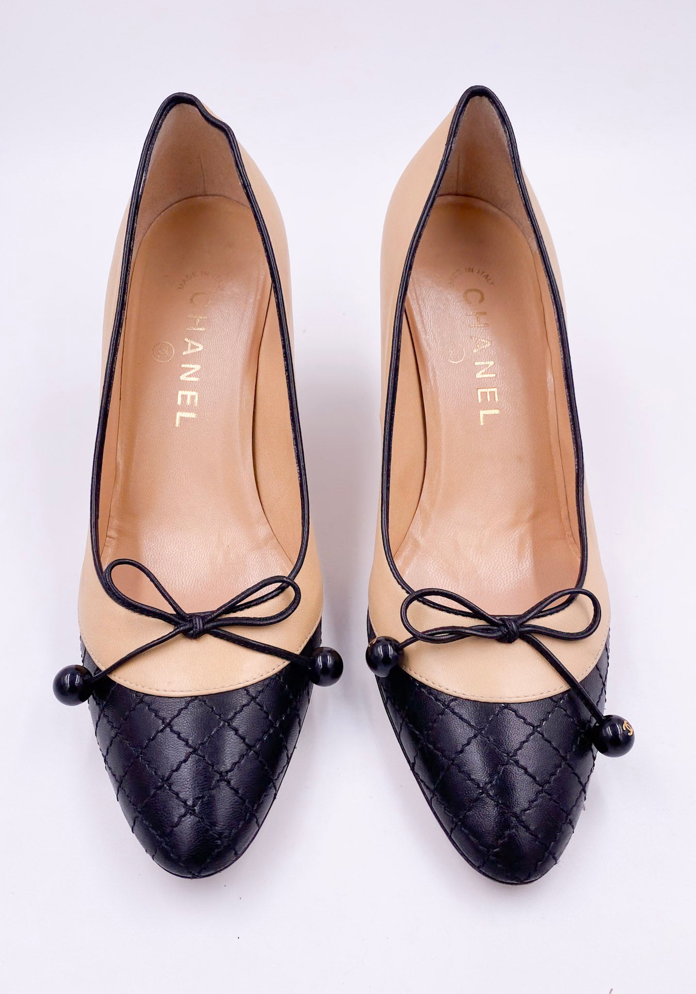 Chanel Beige Pump with Black Quilted Toe