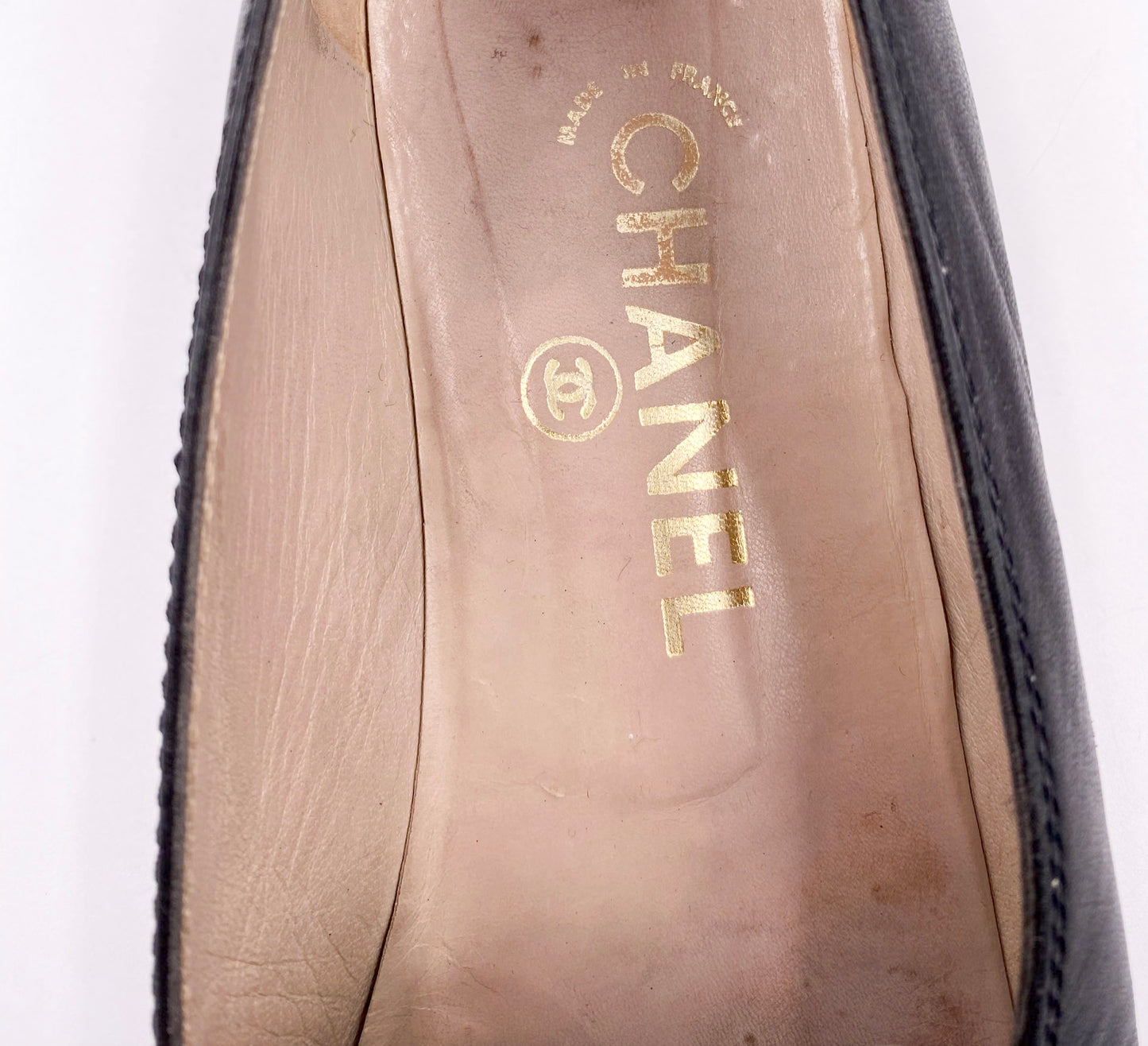 Chanel Black/White Loafers with Gold Emblem