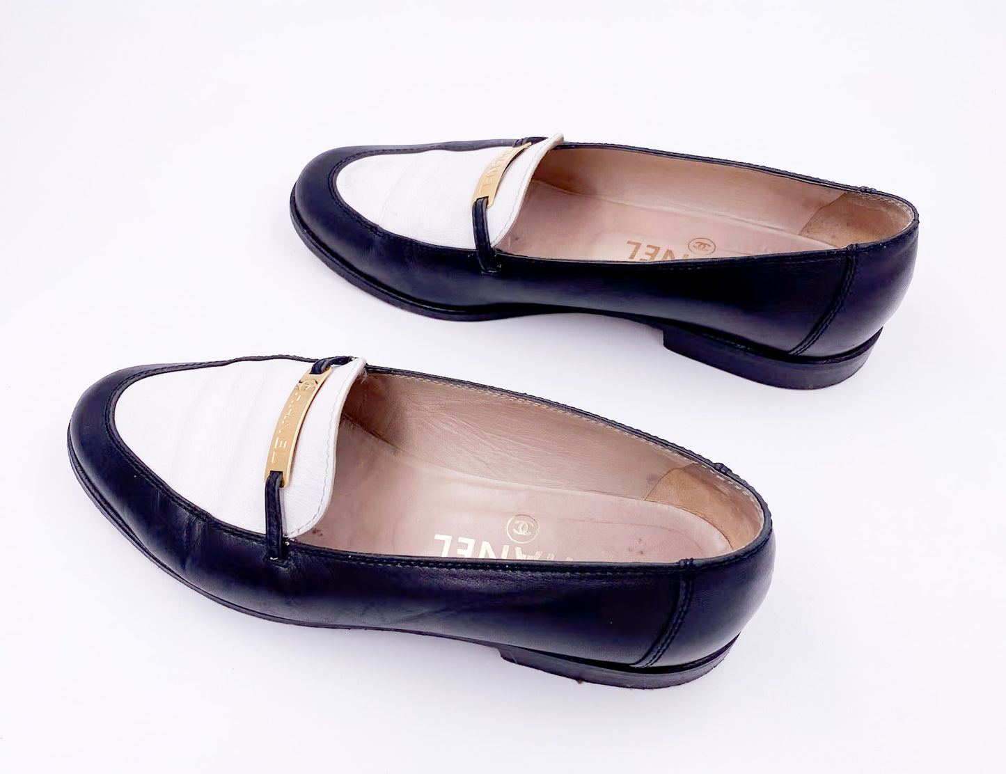 Chanel Black/White Loafers with Gold Emblem