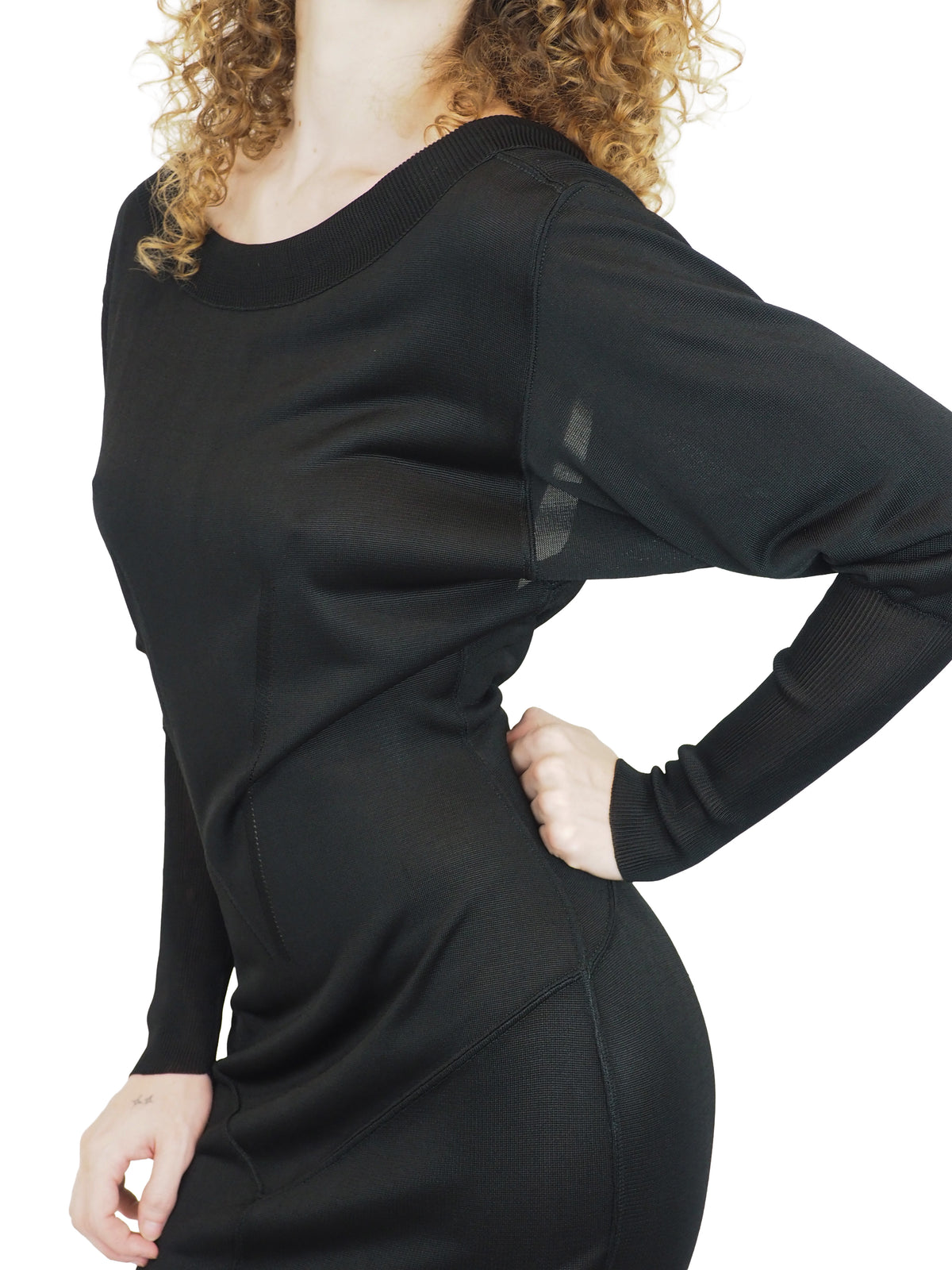 A vintage 1990s alaia black long-sleeve bodycon knit dress with a boat neckline open back detail
