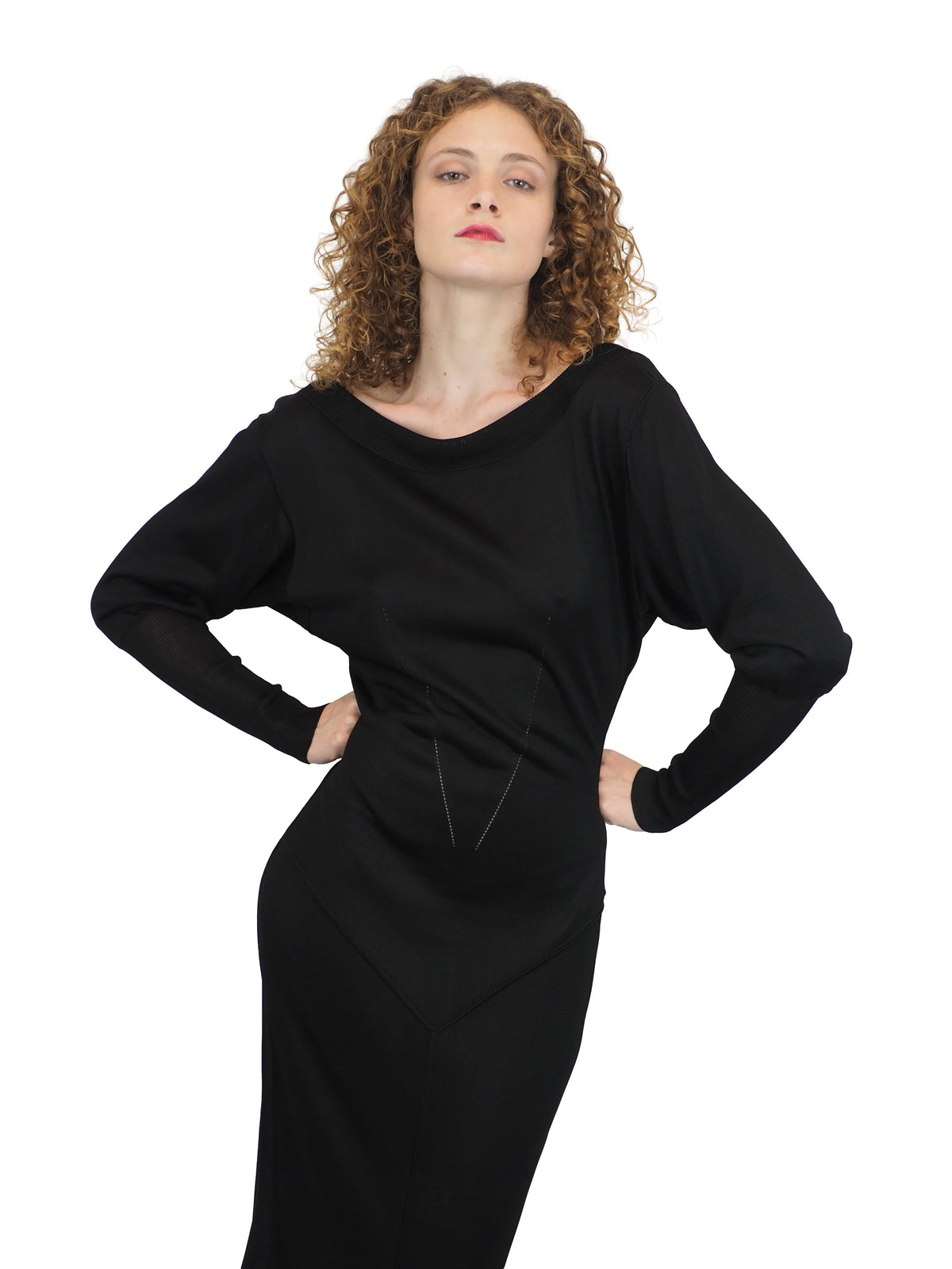 A vintage 1990s alaia black long-sleeve bodycon knit dress with a boat neckline open back detail