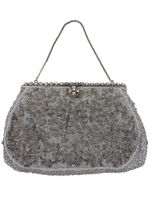 A vintage Elizabeth Arden silver-gray beaded evening clutch bag with a chain strap and a decorative crystal-embellished clasp