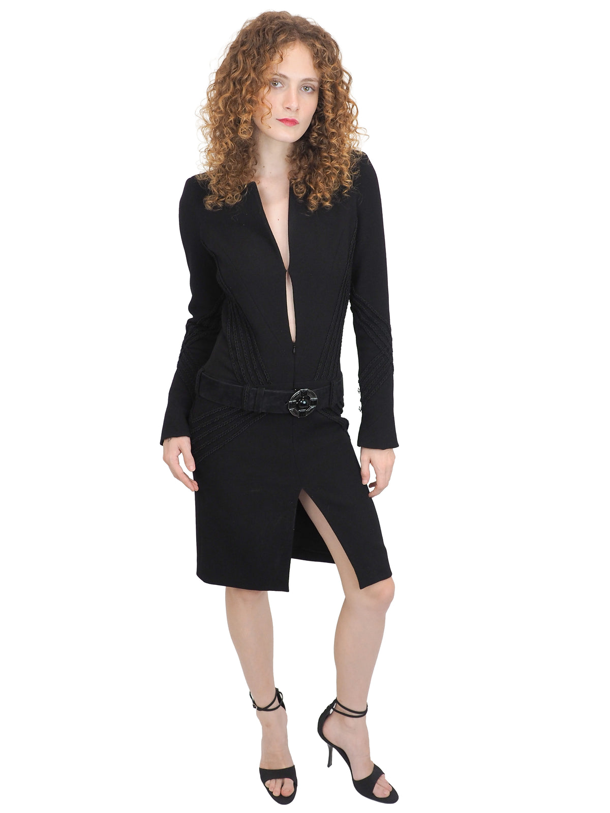 A vintage 2009 Chanel black long-sleeve wool dress with a plunging V-neckline, a matching black belt with a round silver buckle
