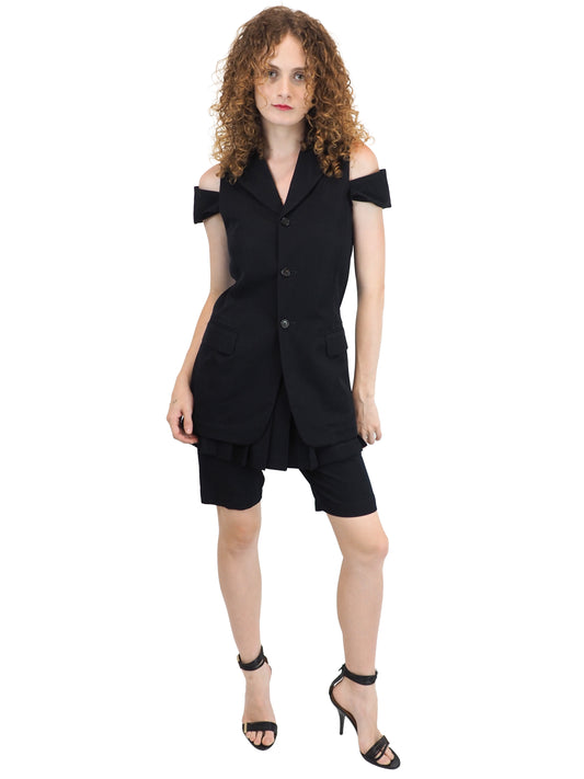 A vintage comme des garçons cold-shoulder blazer with matching navy shorts