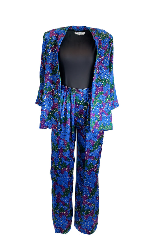 Colorful YSL rive gauche 80s floral-patterned outfit with a jacket and pants on a white background