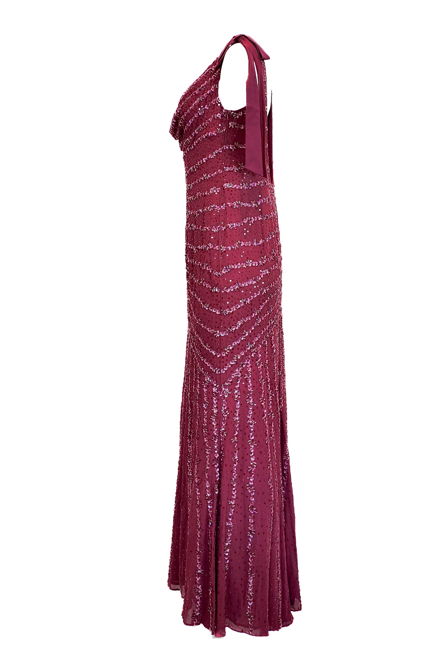 Magenta evening gown with a halter neck on a white background