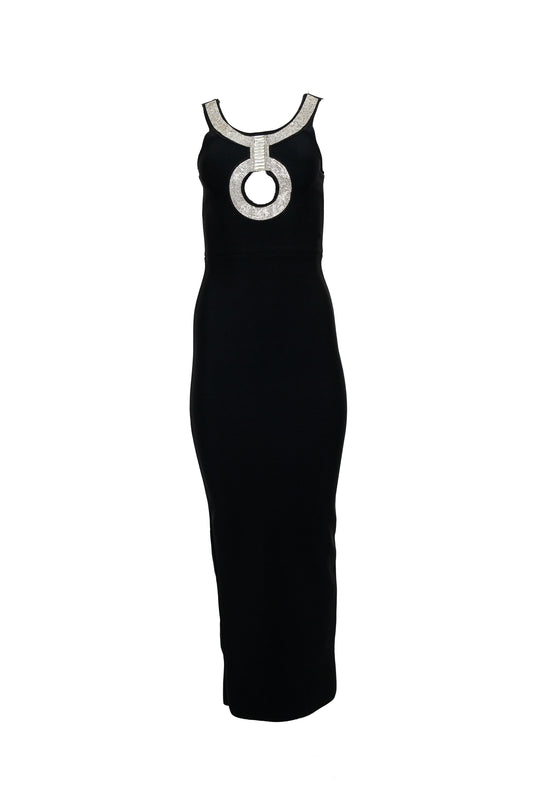 Black dress with a circular silver detail on a white background