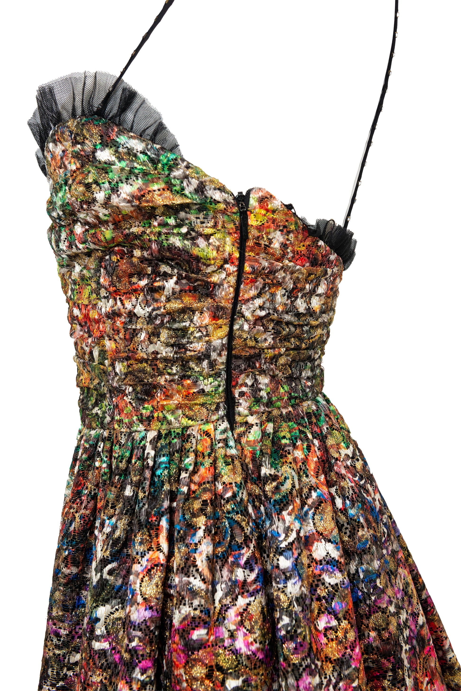 Multicolored dress on a mannequin with a white background