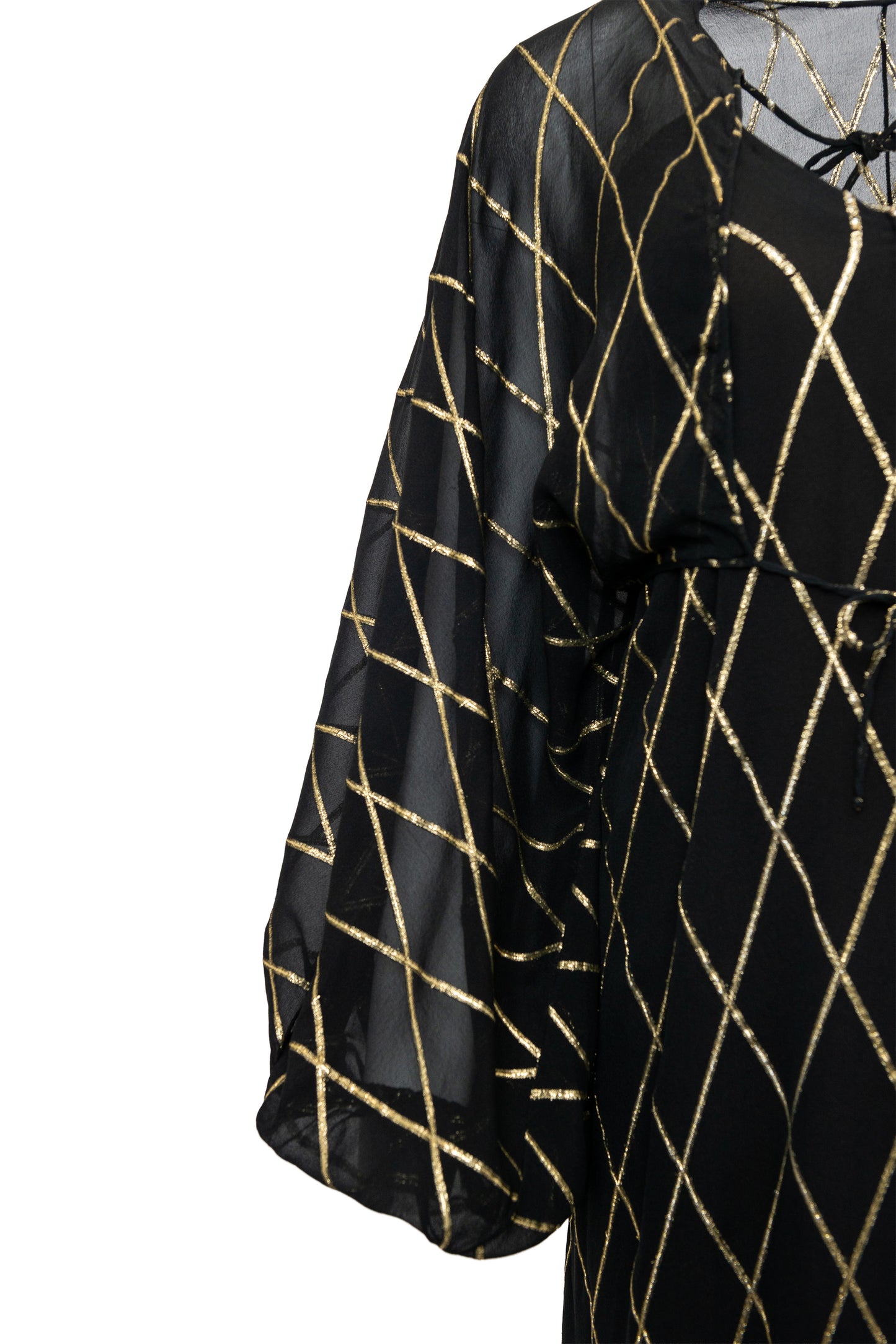 Black top with gold geometric pattern on a white background