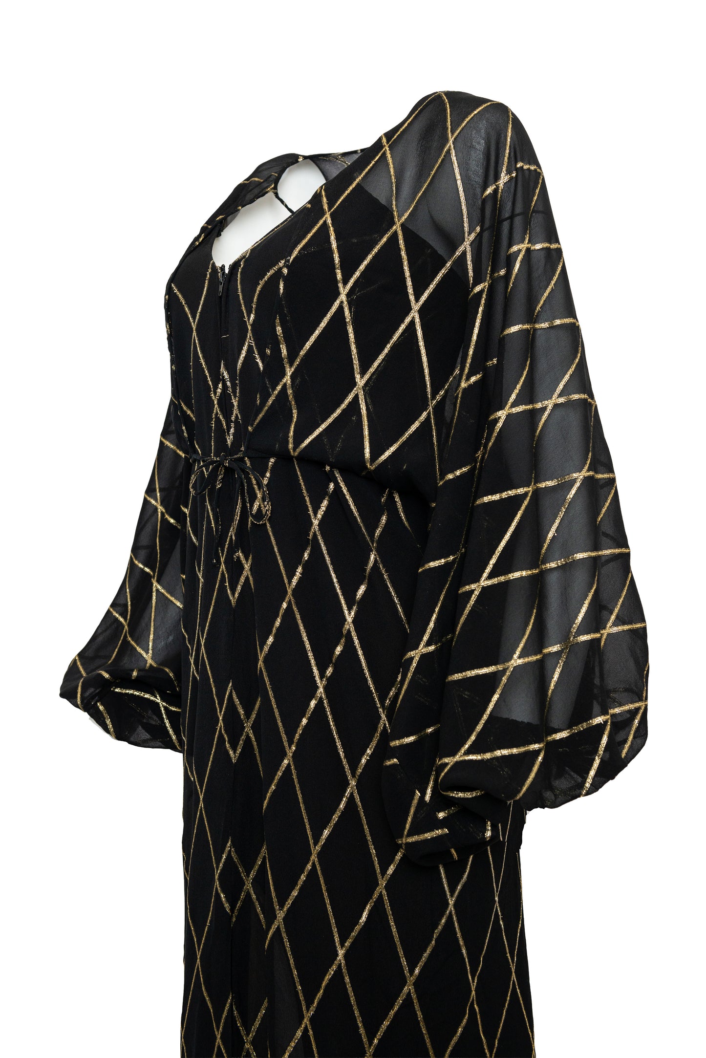 Black dress with gold geometric pattern on a white background