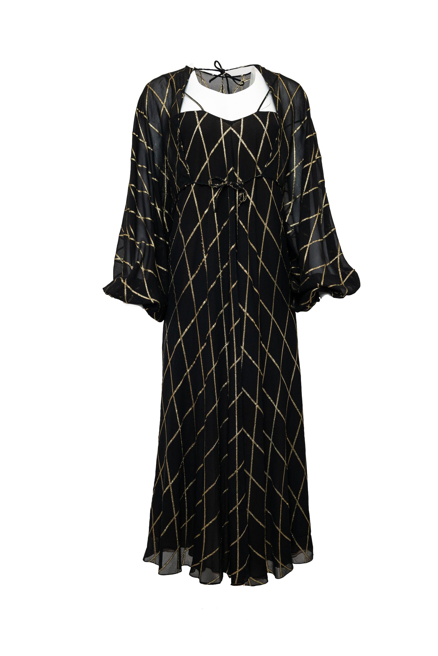 Black dress with gold geometric pattern on a white background