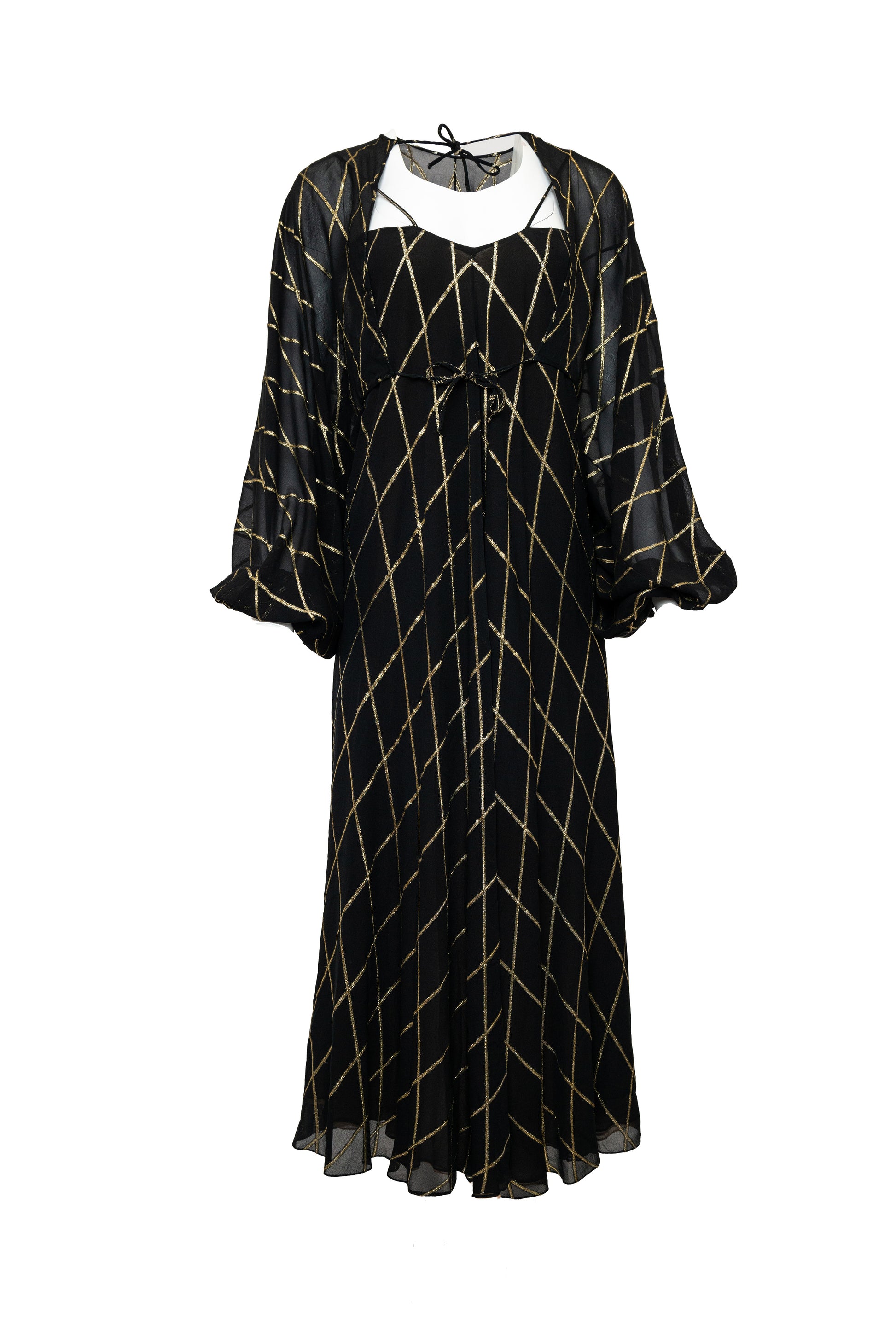 Black dress with gold geometric pattern on a white background