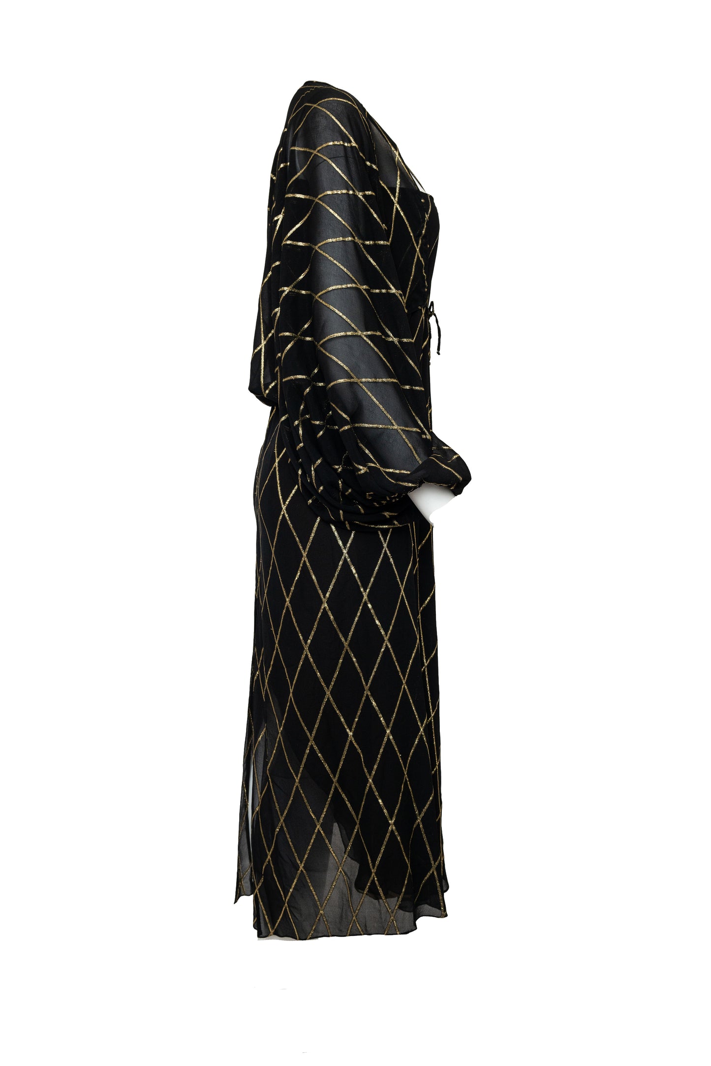 Black dress with gold geometric pattern on a white background