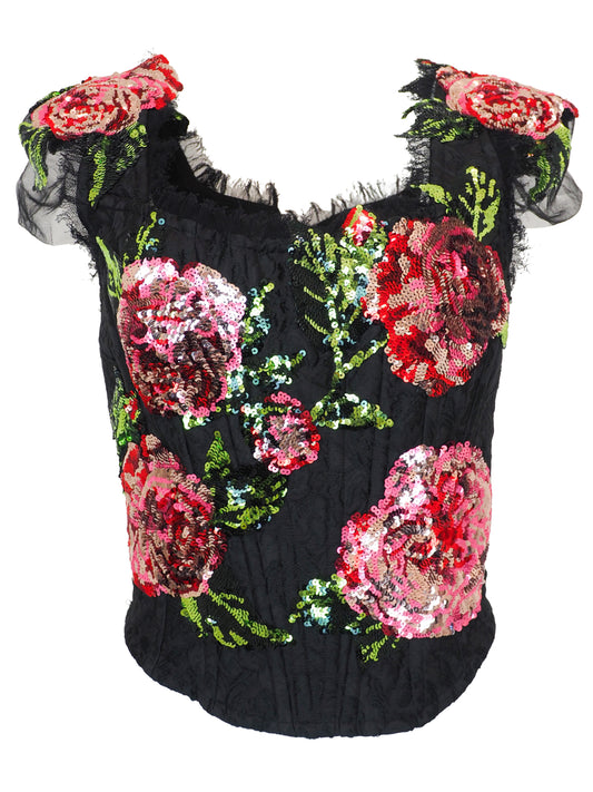 A Vintage dolce and Gabbana 2017 black sequined crop top featuring large pink and red floral sequin patterns with green sequin leaves, sheer ruffled cap sleeves, and a mesh  neckline.