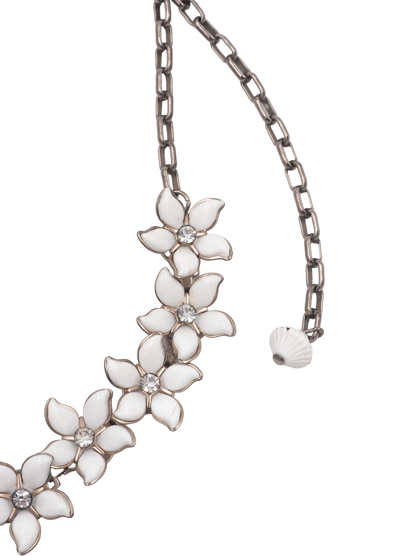 A vintage bridal silver-tone chain necklace featuring a row of white enamel flower blossoms with small clear rhinestone accents