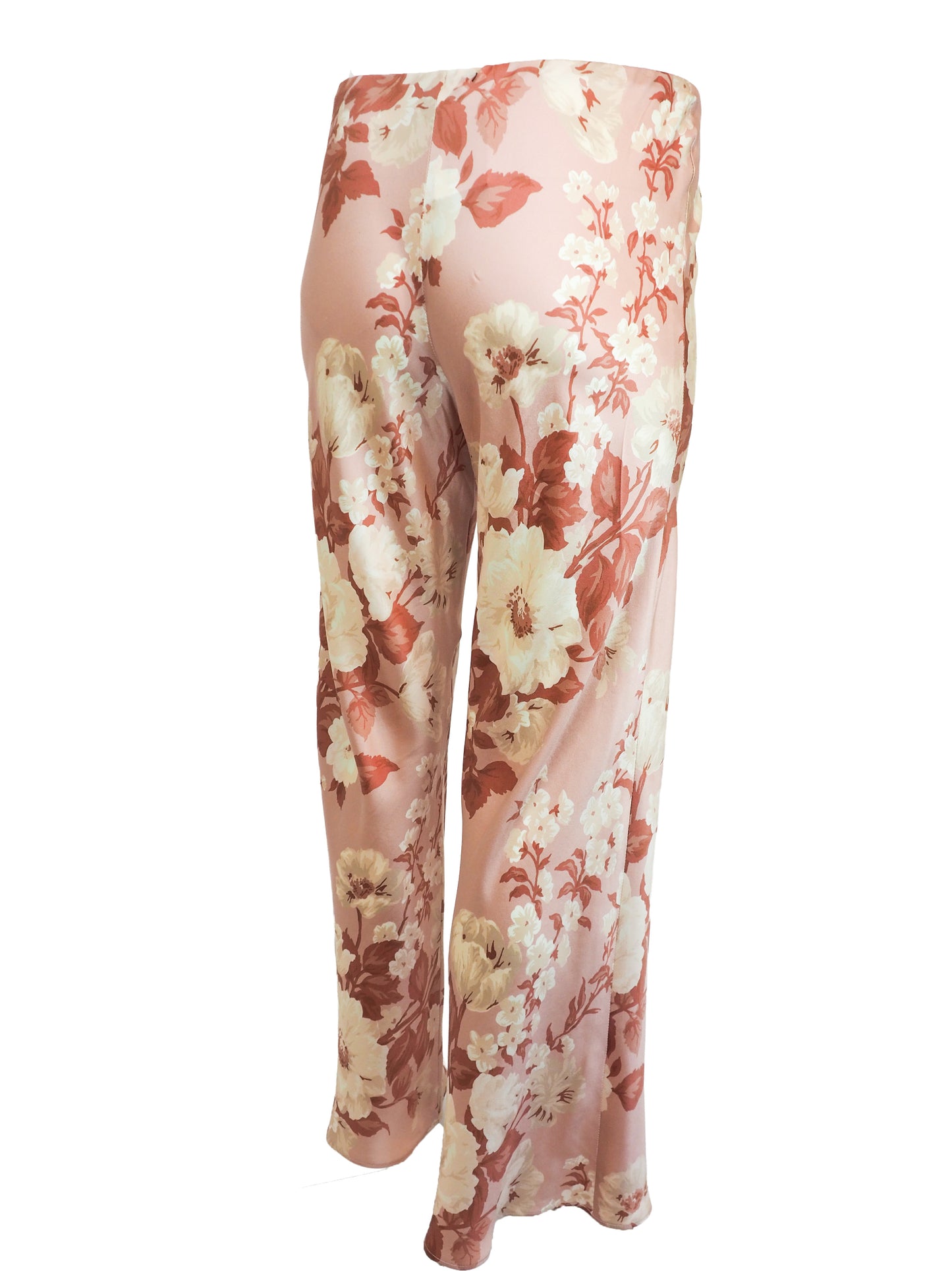vintage Jane booke wide-leg trousers in a light pink satin-like fabric with an all-over floral print in cream, rust, and muted red, shown against a plain white background.