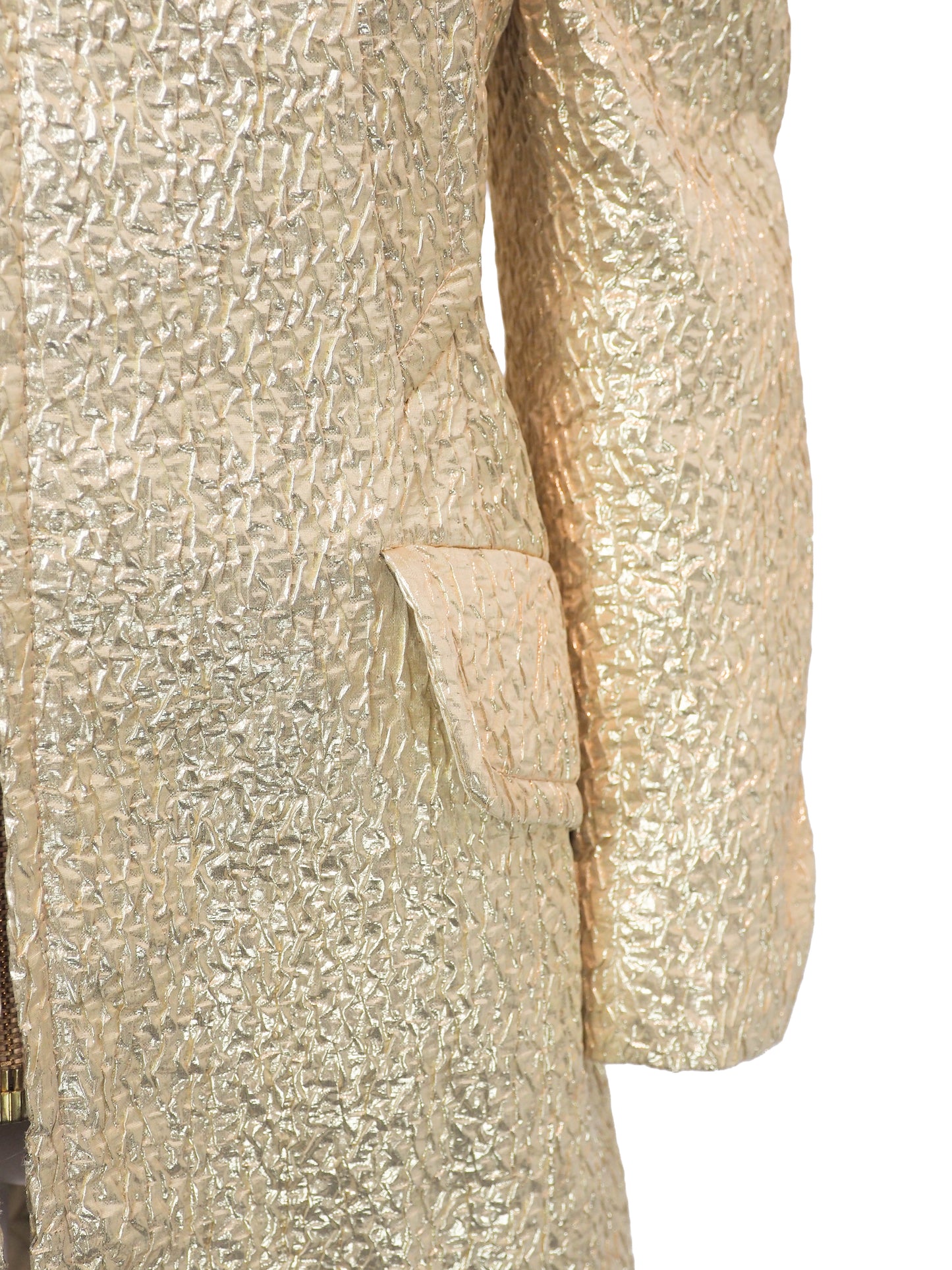 A vintage James galanos metallic gold textured coat with a high stand collar, front zipper, and side pockets