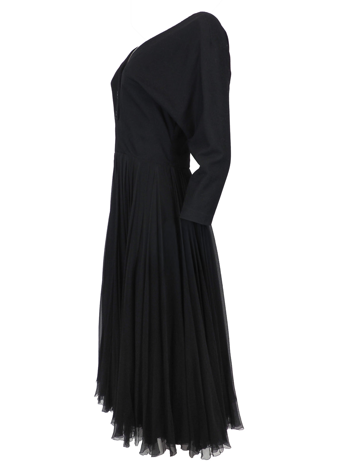 A vintage galanos black long-sleeve midi dress with a V-neckline, three-quarter button placket, and a pleated chiffon skirt