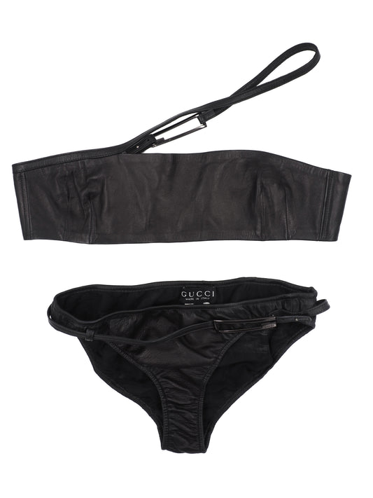 A vintage tom ford for gucci black two-piece bikini set by Gucci, featuring a strapless bandeau-style top with a side strap and matching low-rise bikini bottoms
