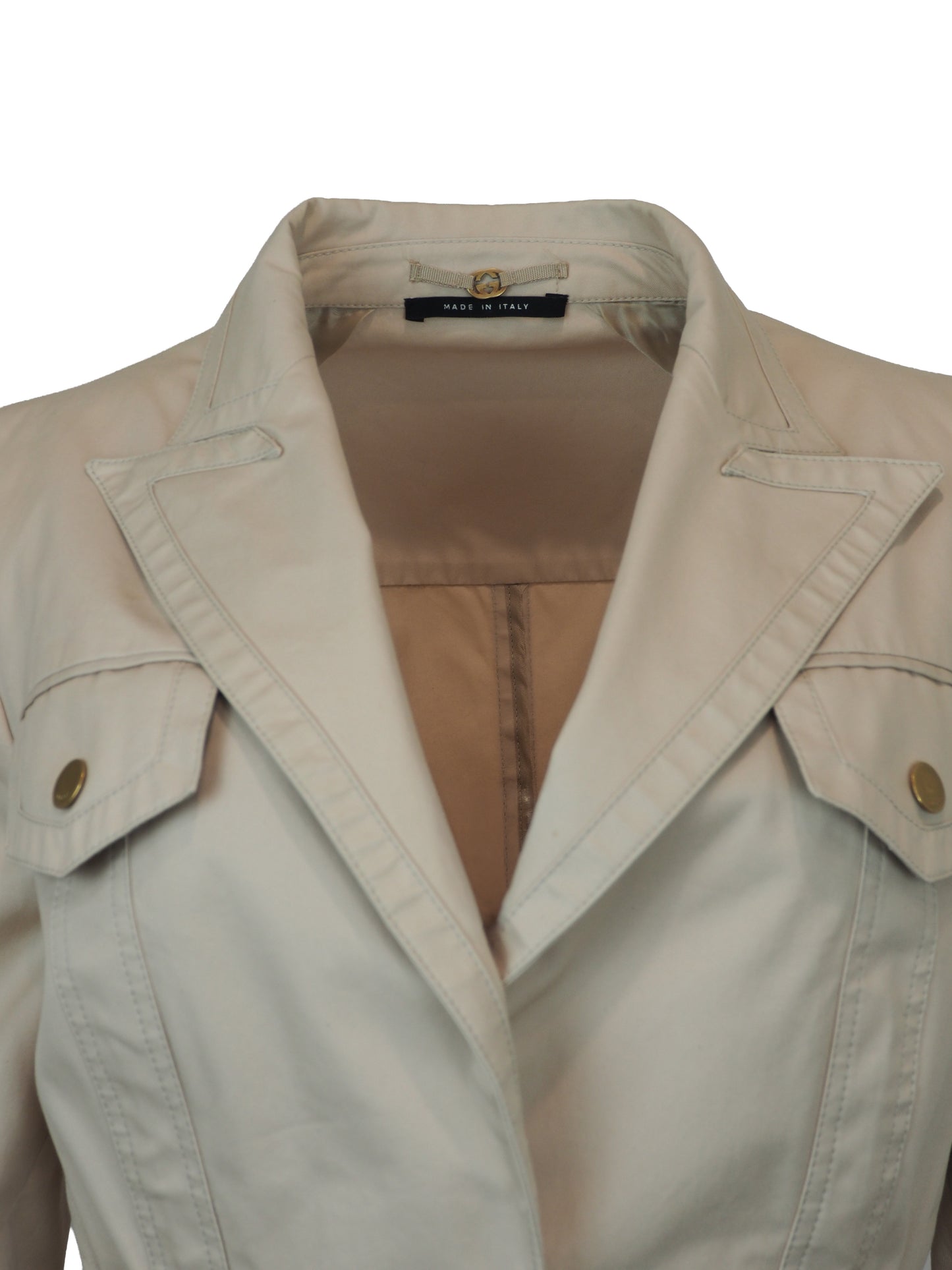 A women's vintage Tom Ford Gucci 2003 beige utility-style blazer jacket with a notched lapel collar, buttoned flap chest pockets, a gathered waist seam, and two large front flap pockets