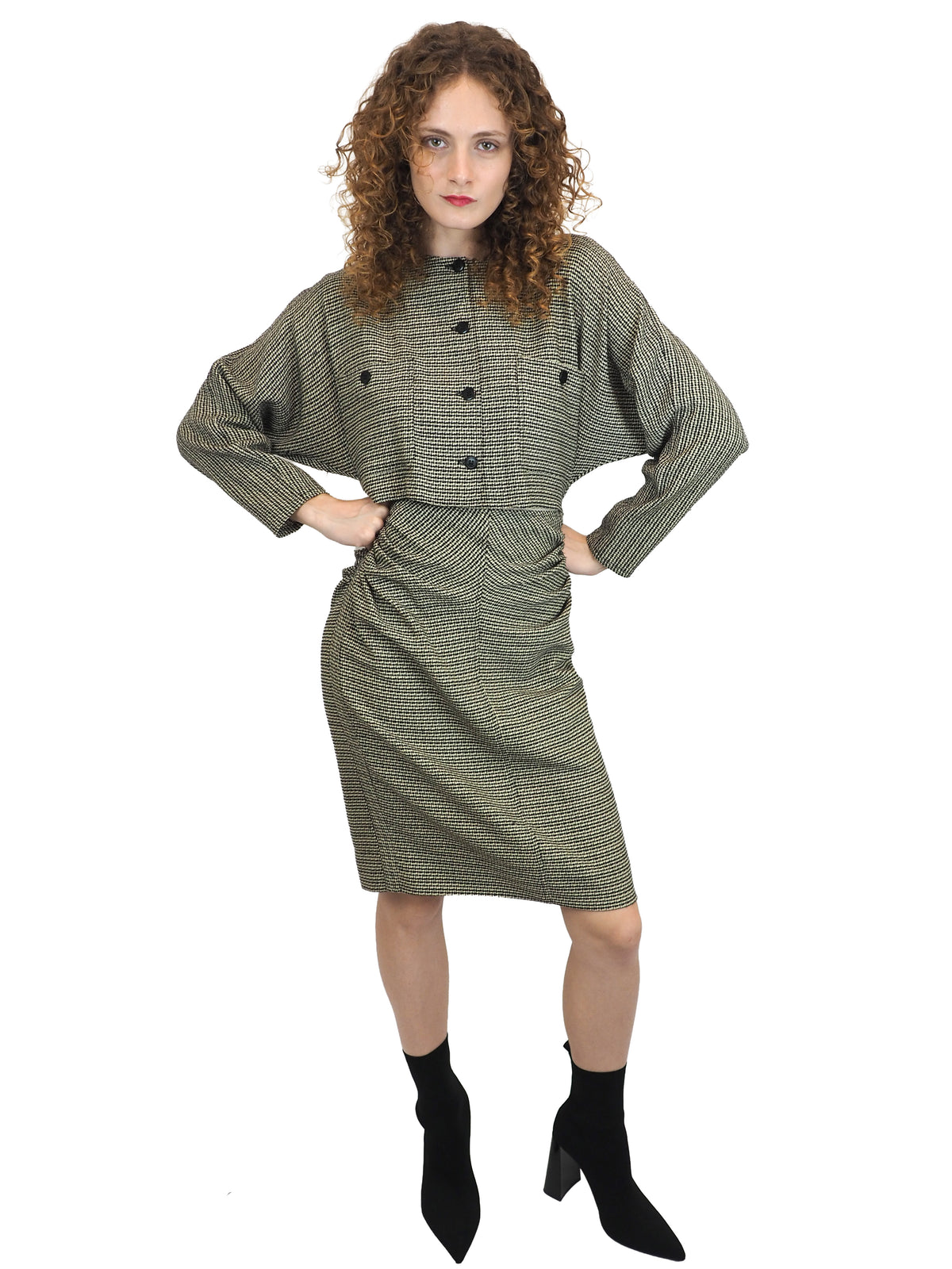A vintage houndstooth Gucci 1980s checkered mini dress with buttons and a center cut out
