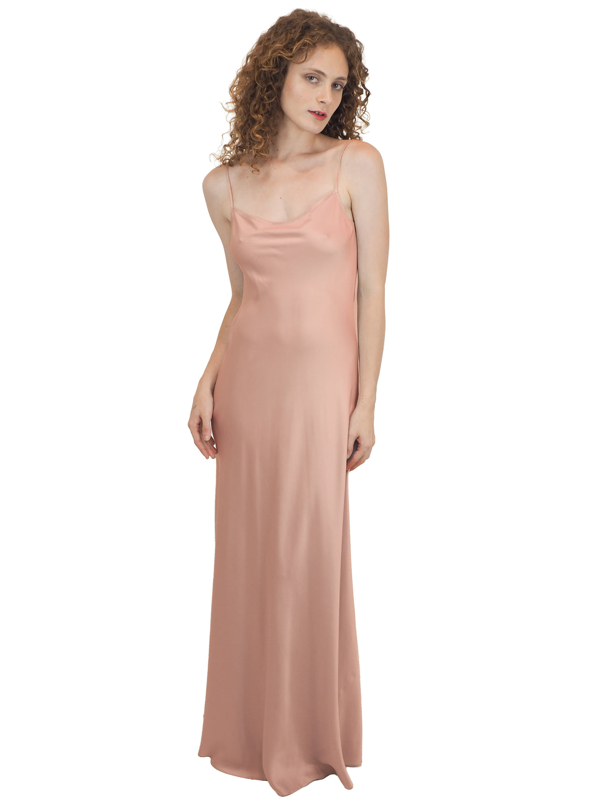 a vintage bridal floor-length, satin silk slip gown in a dusty rose pink color 
