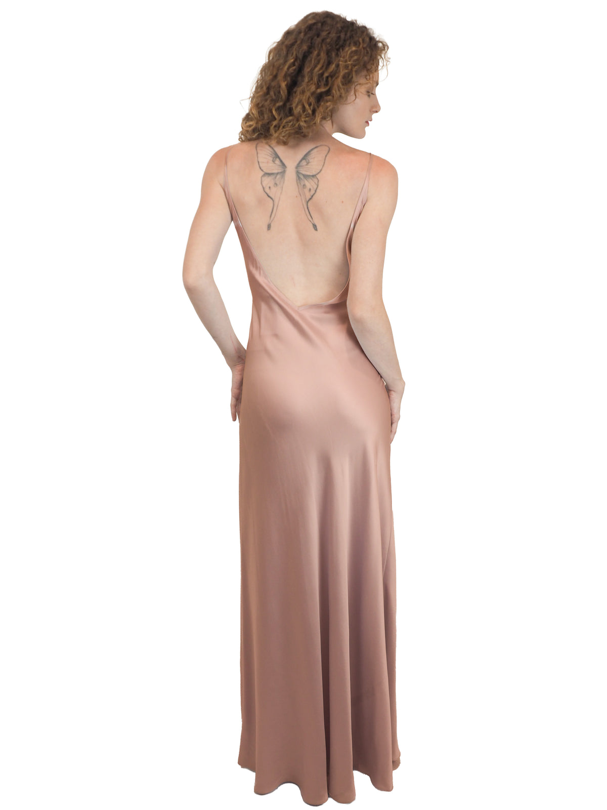 a vintage bridal floor-length, satin silk slip gown in a dusty rose pink color 