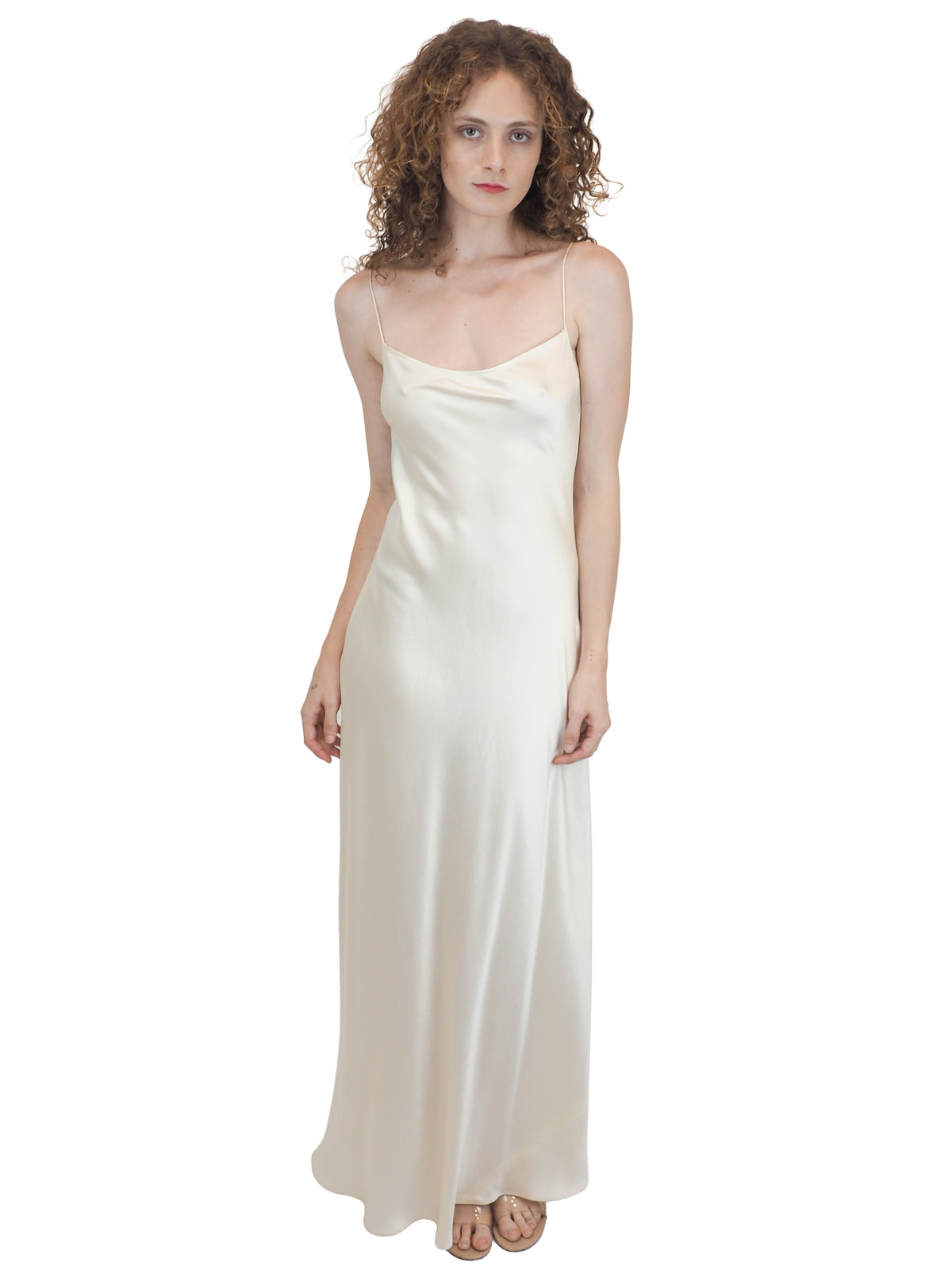 a vintage bridal floor-length, satin silk slip gown in an ivory white color 